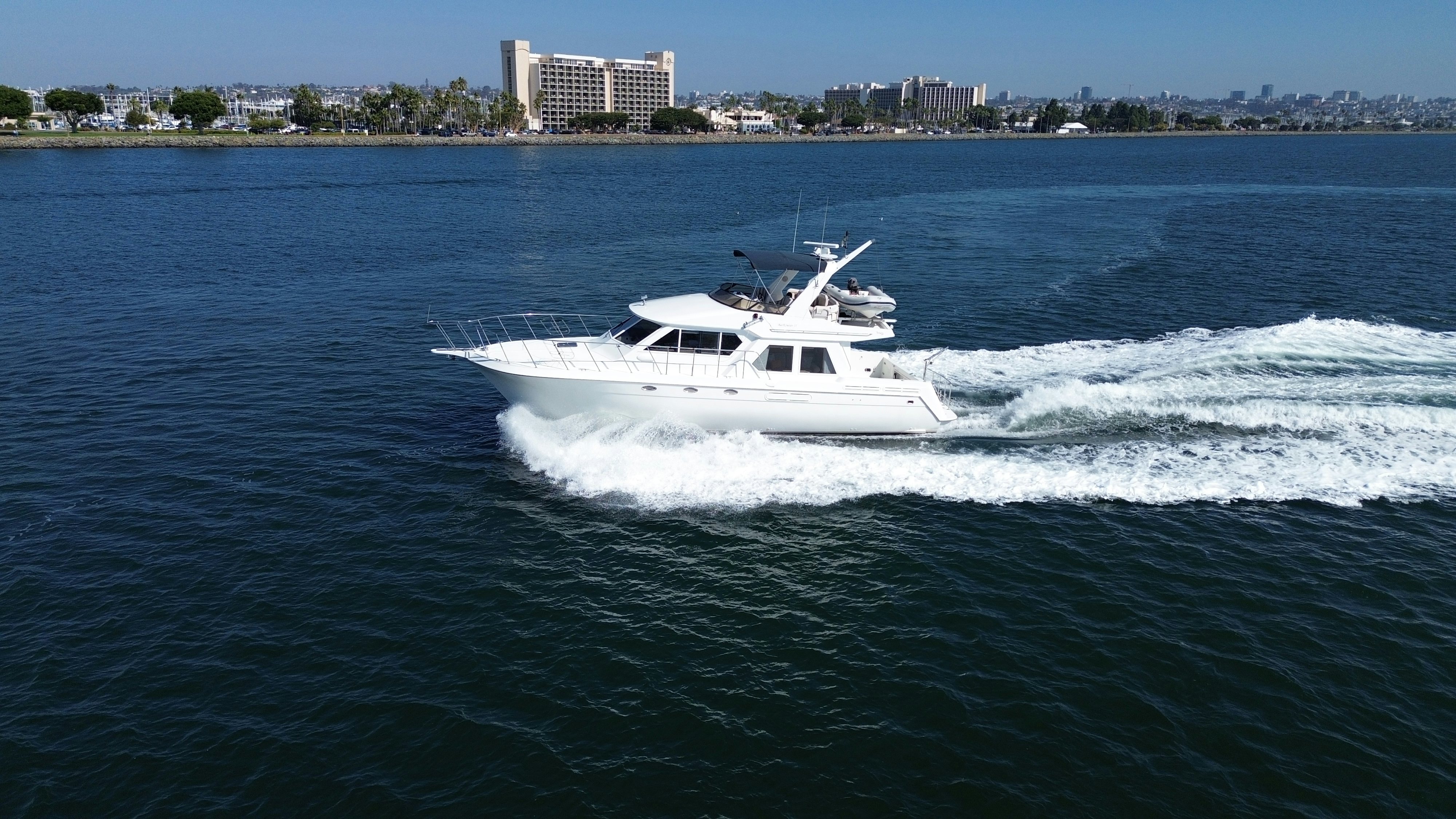 a white boat on the water aboard BARKRUISER Yacht for Sale