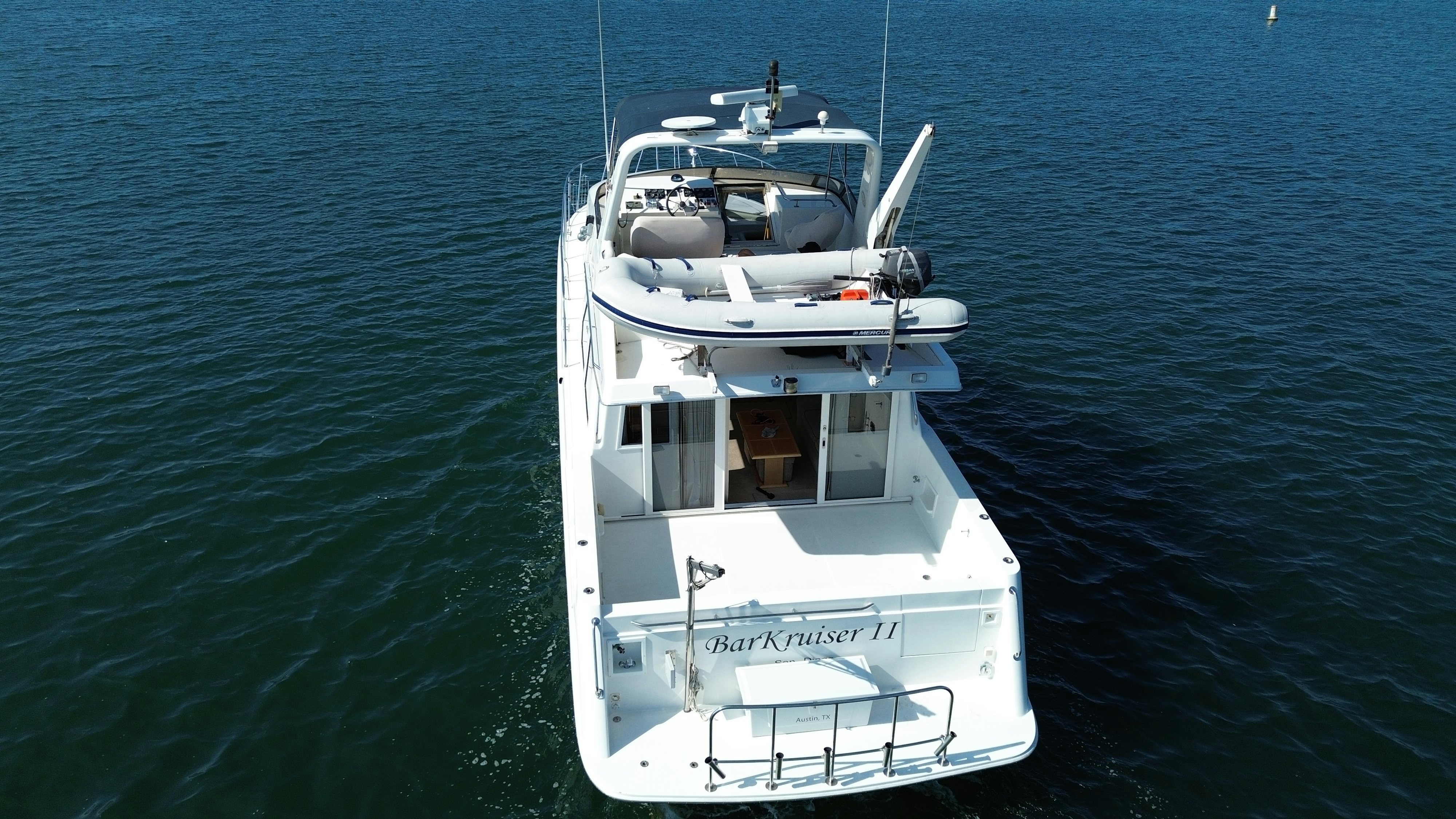 a white boat in the water aboard BARKRUISER Yacht for Sale