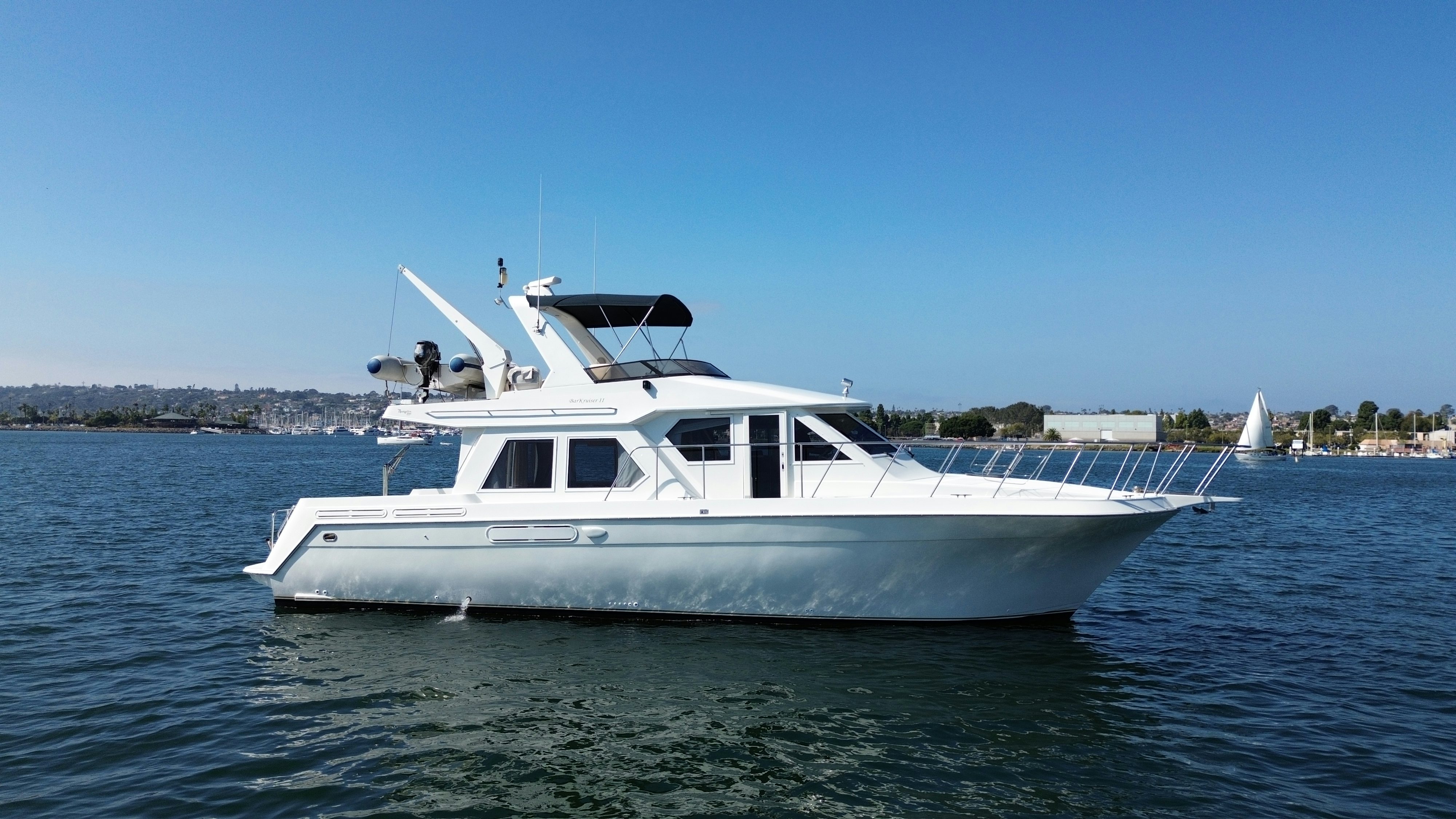 a white boat on the water aboard BARKRUISER Yacht for Sale