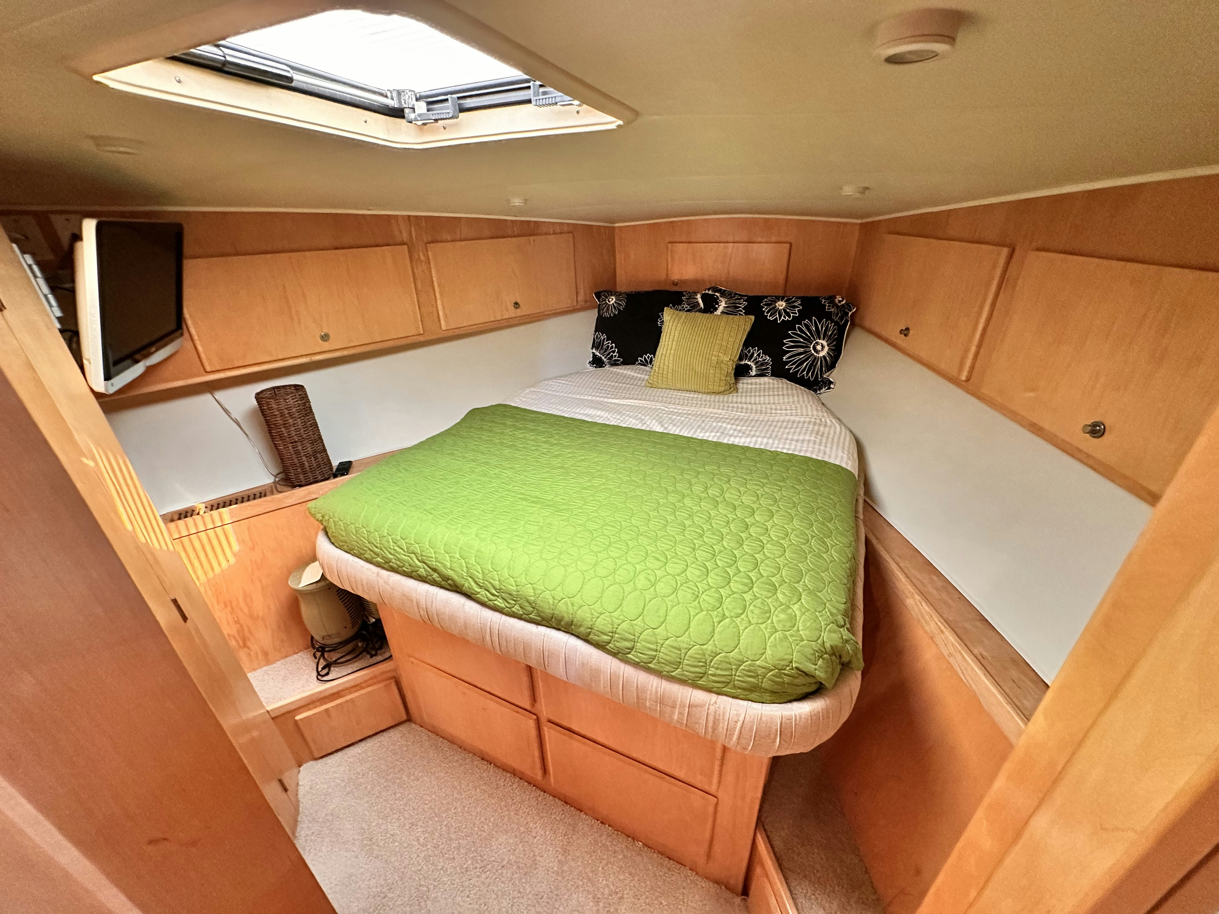 a bed in a room aboard BARKRUISER Yacht for Sale