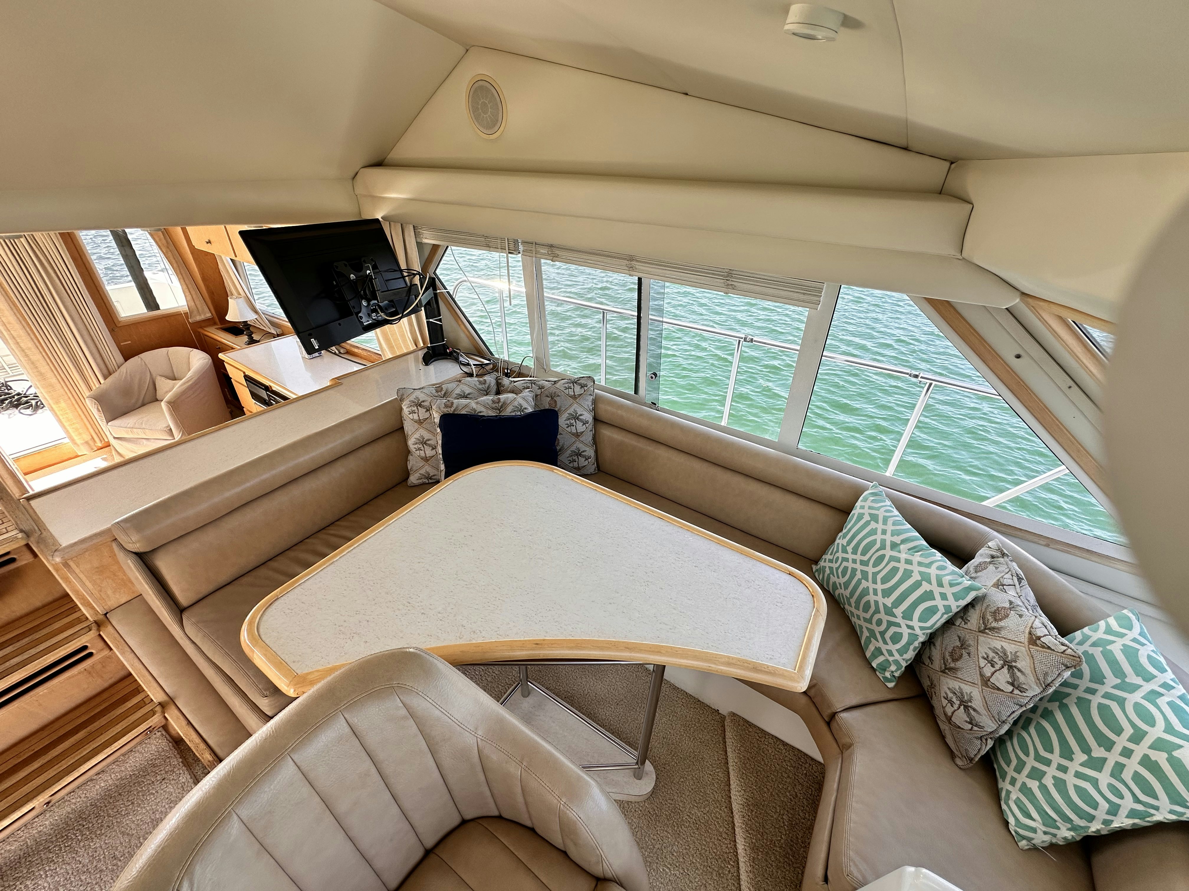 a room with a bed and a table aboard BARKRUISER Yacht for Sale