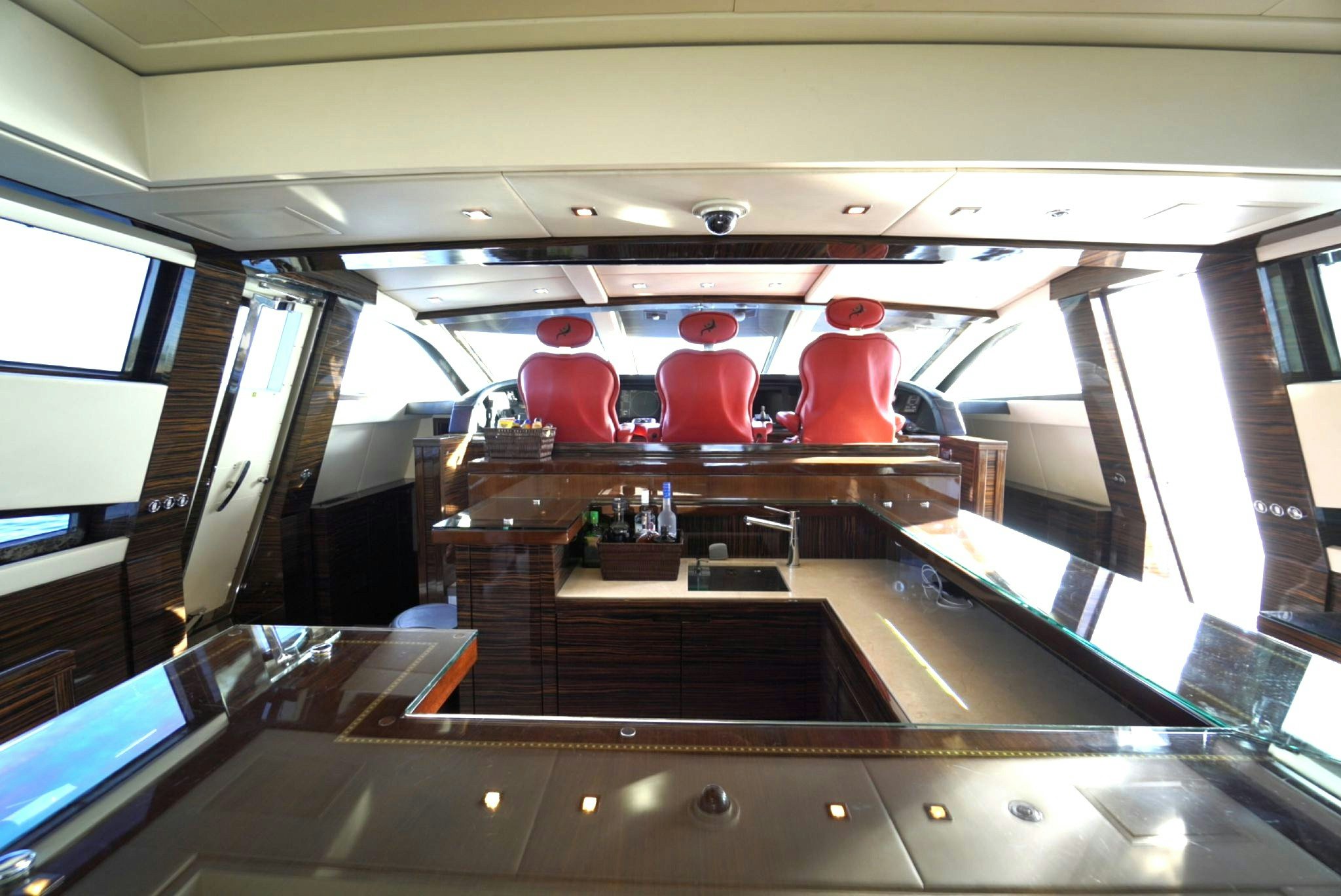 a couple of people sitting in a room with a table and chairs aboard GO Yacht for Sale