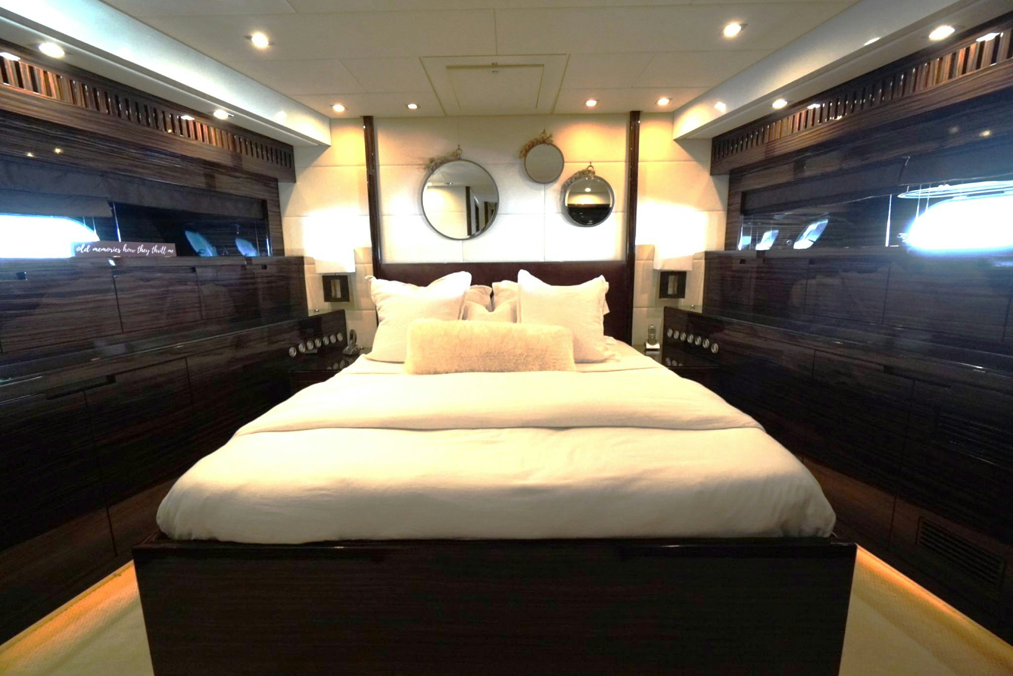 a bed in a room aboard GO Yacht for Sale