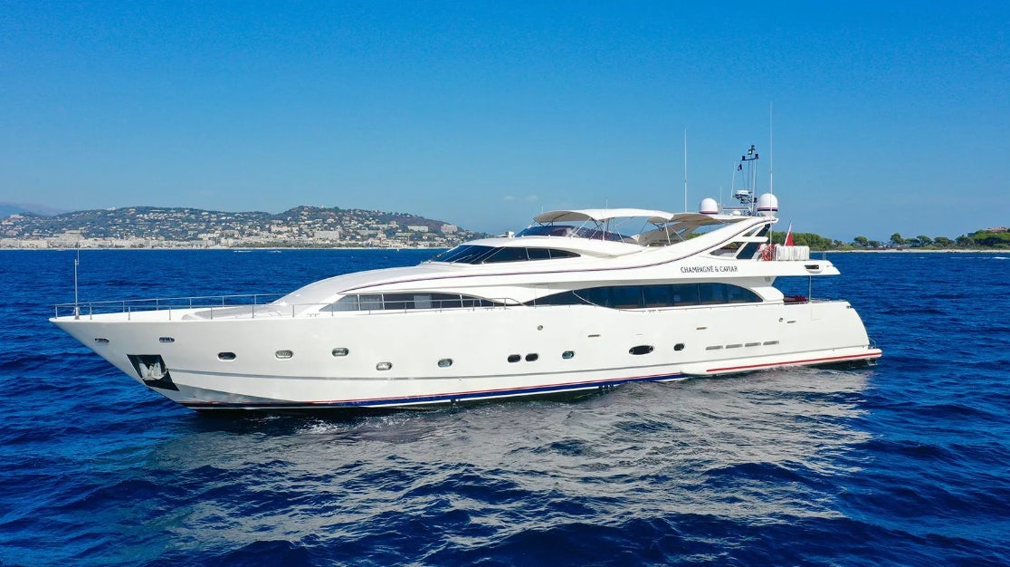 a white yacht in the water aboard CHAMPAGNE & CAVIAR Yacht for Charter