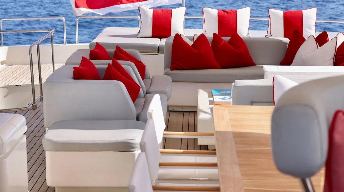 a group of chairs on a boat aboard CHAMPAGNE & CAVIAR Yacht for Charter