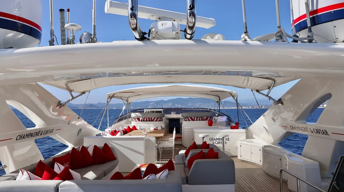 a row of white and red airplanes aboard CHAMPAGNE & CAVIAR Yacht for Charter
