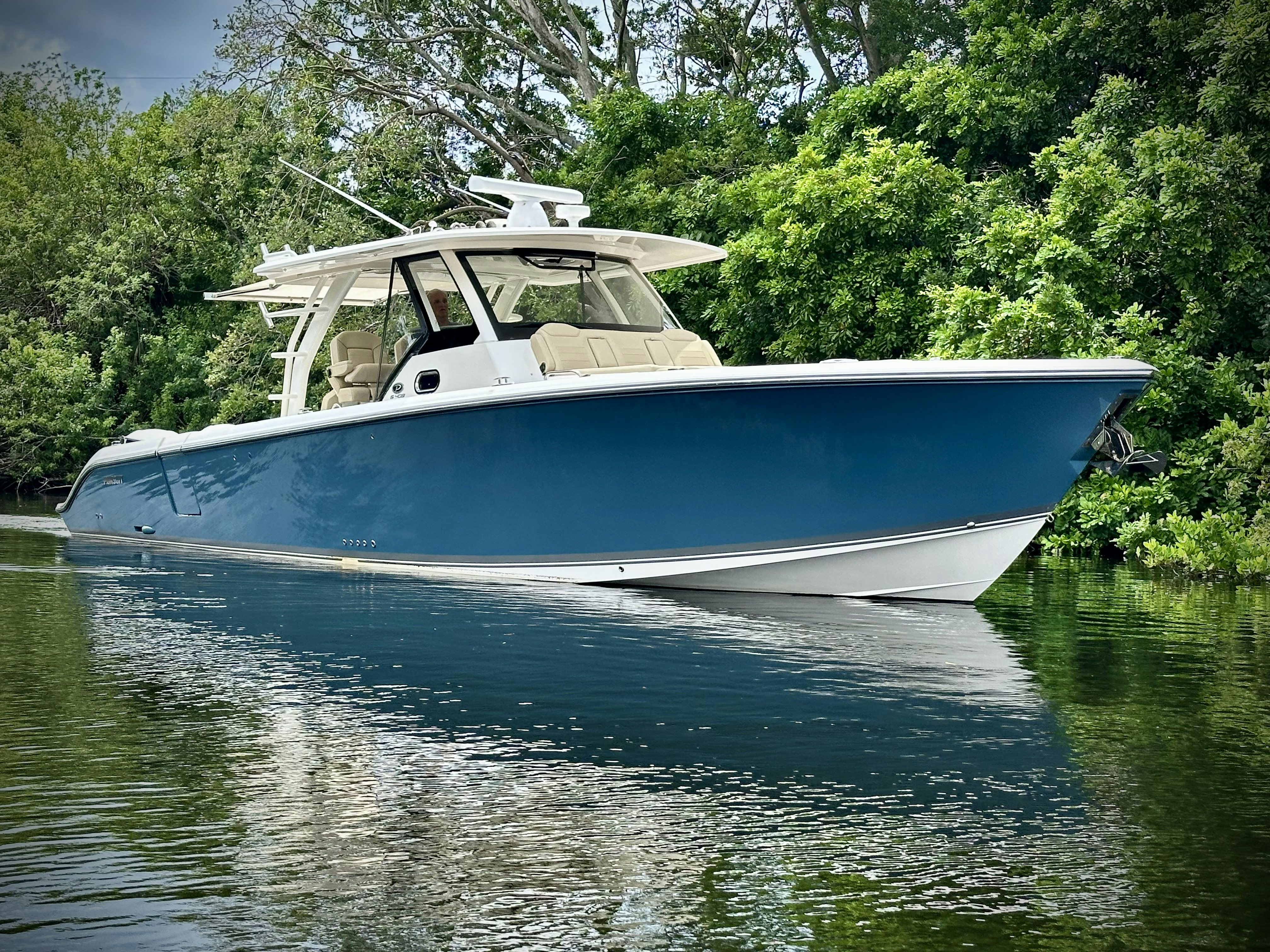 a boat on the water aboard PURSUIT S 408 Yacht for Sale