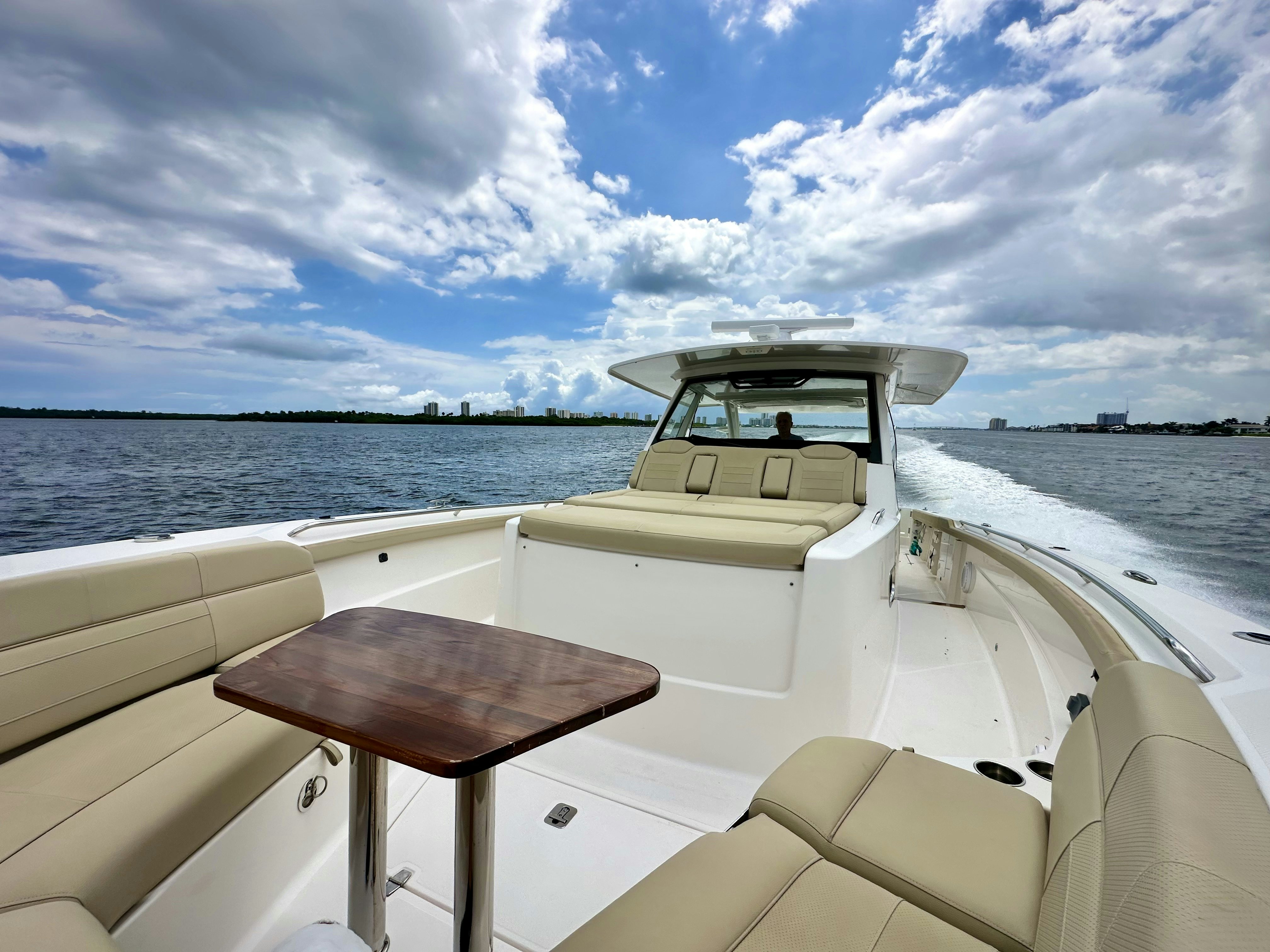 a boat on the water aboard PURSUIT S 408 Yacht for Sale