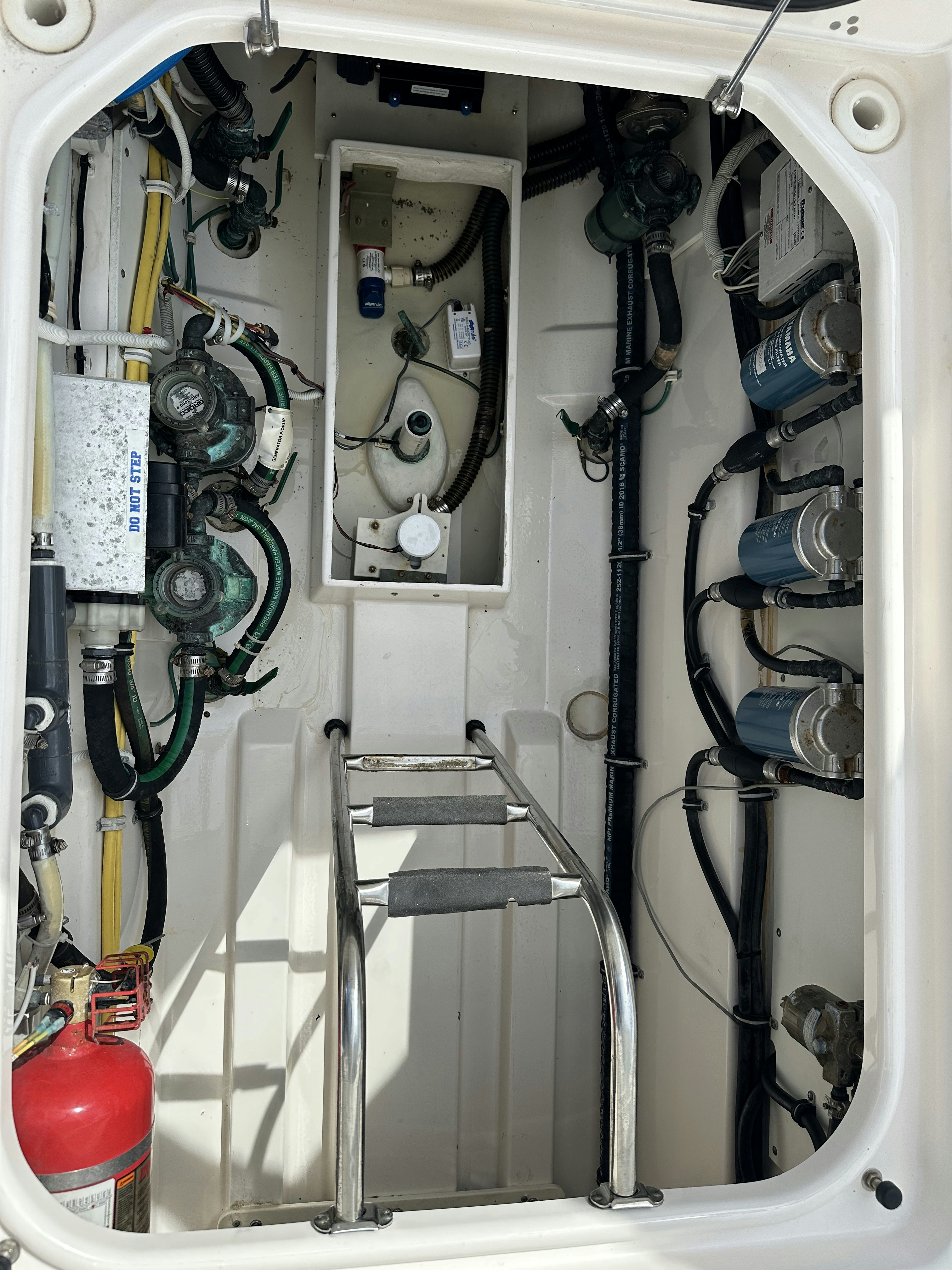 a close-up of a machine aboard PURSUIT S 408 Yacht for Sale