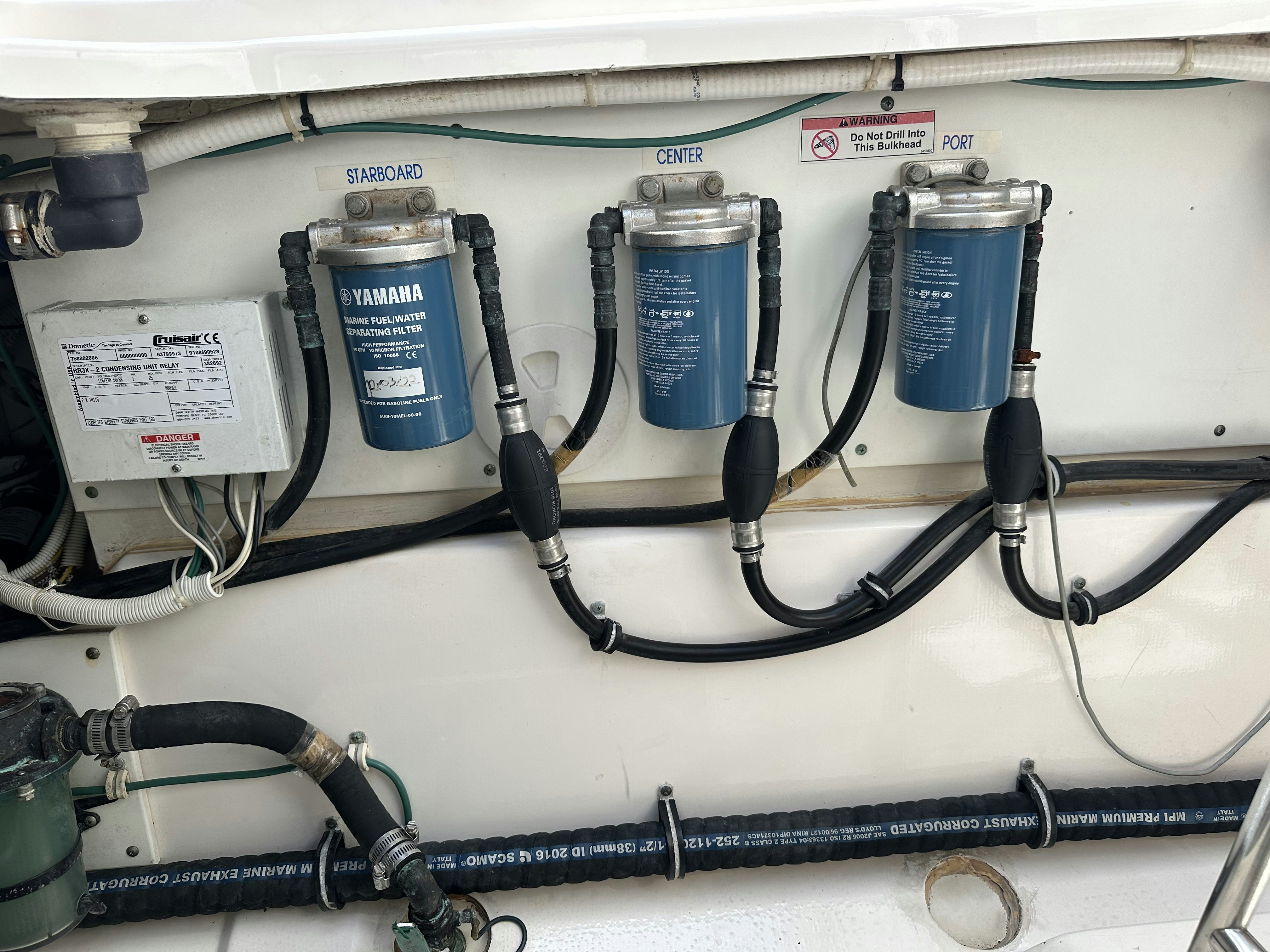 a close-up of a machine aboard PURSUIT S 408 Yacht for Sale