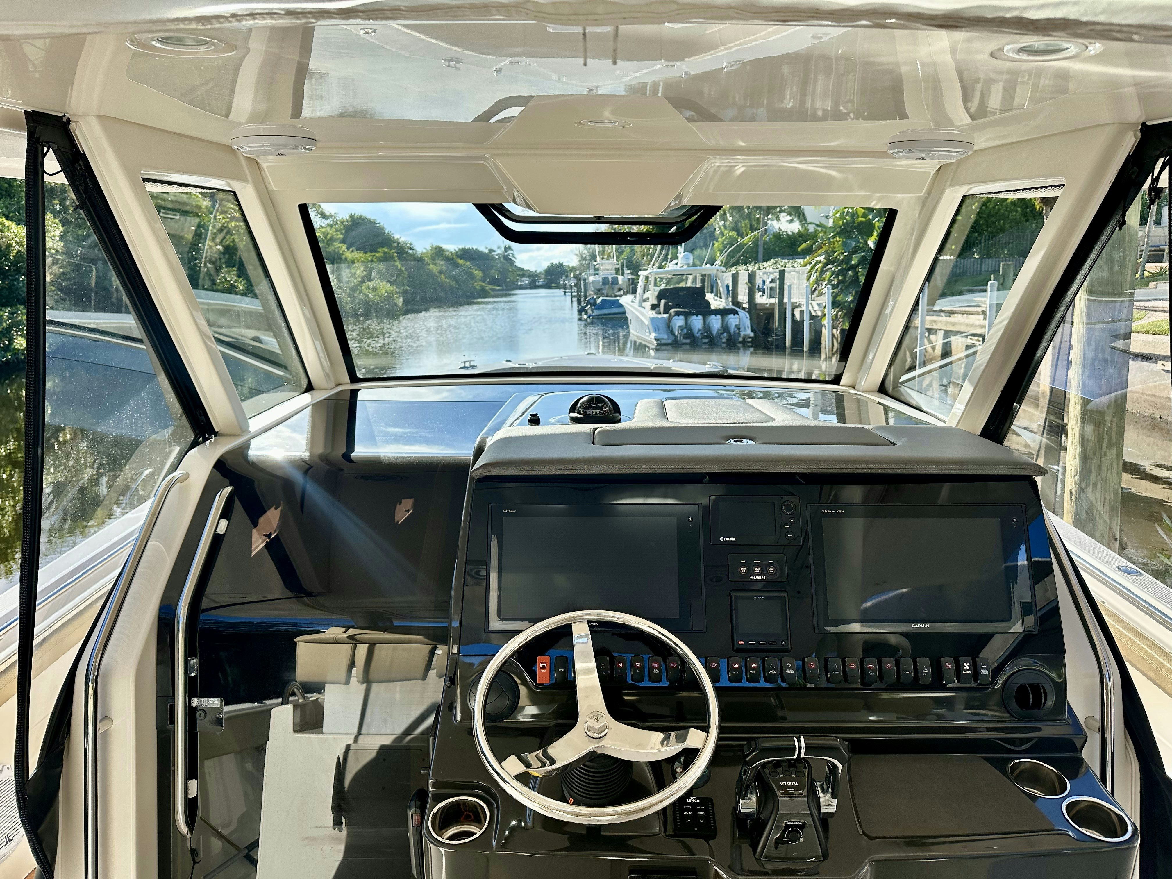 the inside of a car aboard PURSUIT S 408 Yacht for Sale
