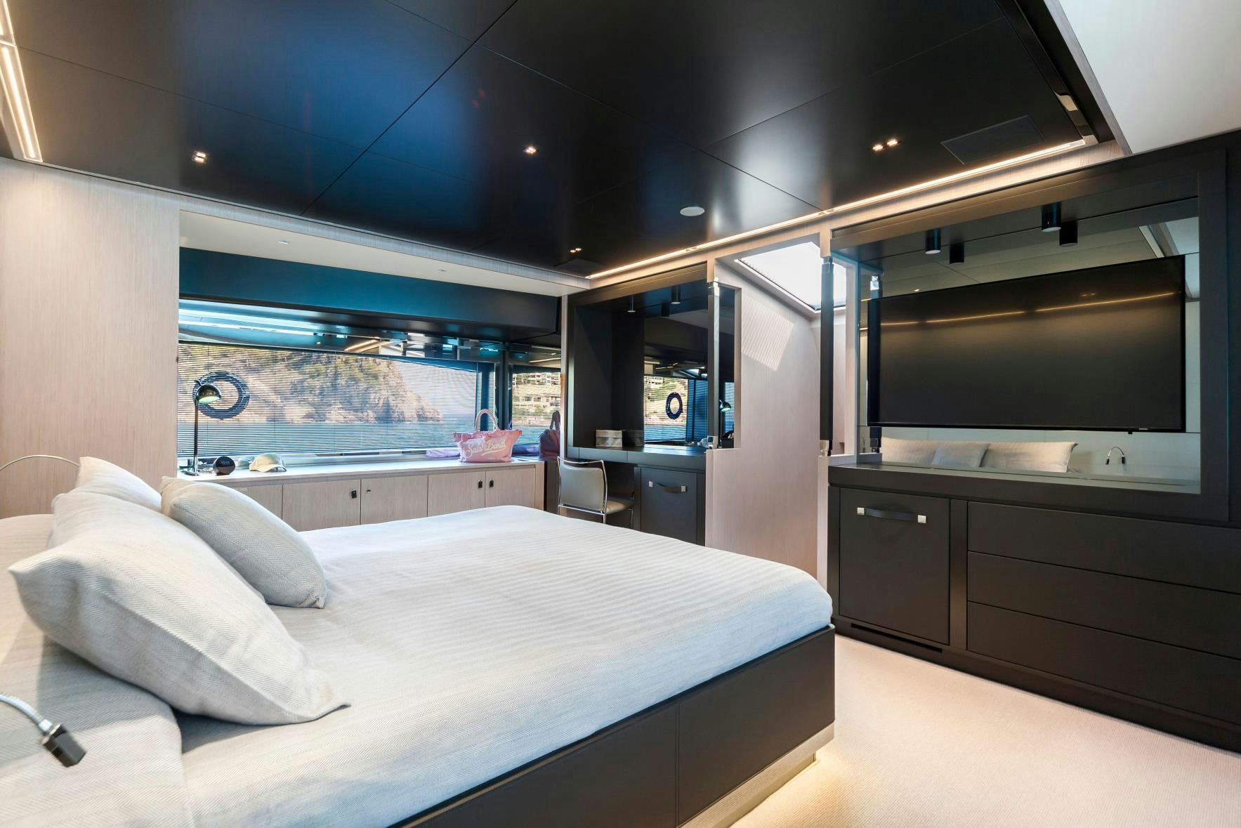 a bed in a room aboard BARRACUDA III Yacht for Charter
