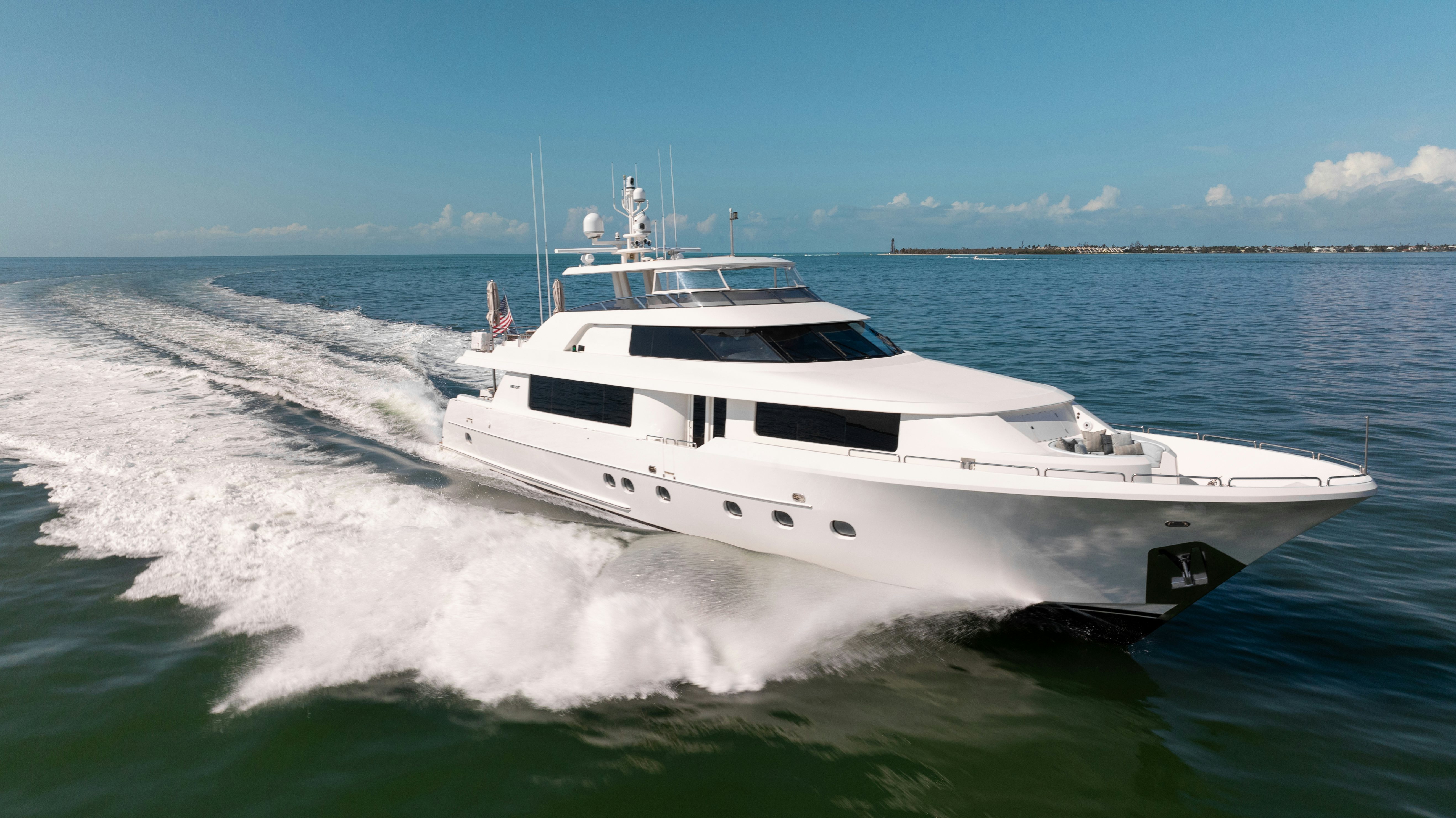 a white yacht on the water aboard REMY ROO Yacht for Sale