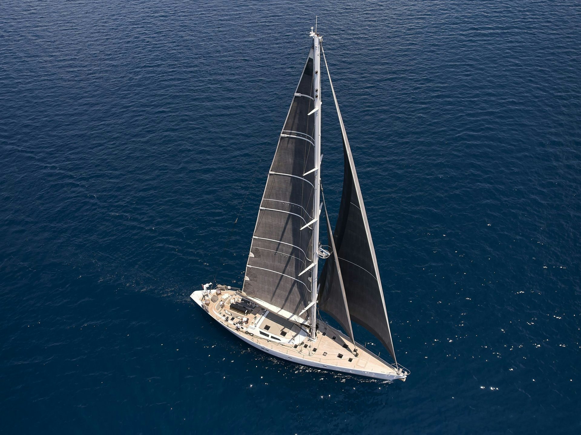 a sailboat in the water aboard AIZU Yacht for Sale