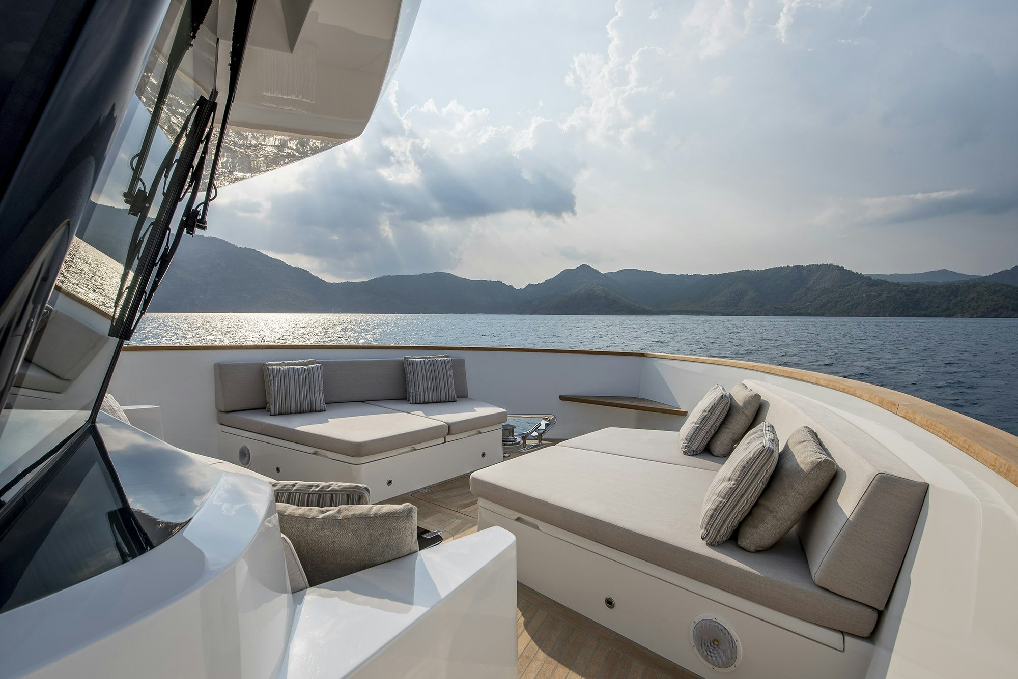 a room with a bed and a view of the ocean aboard NUMARINE 26XP/25 Yacht for Sale