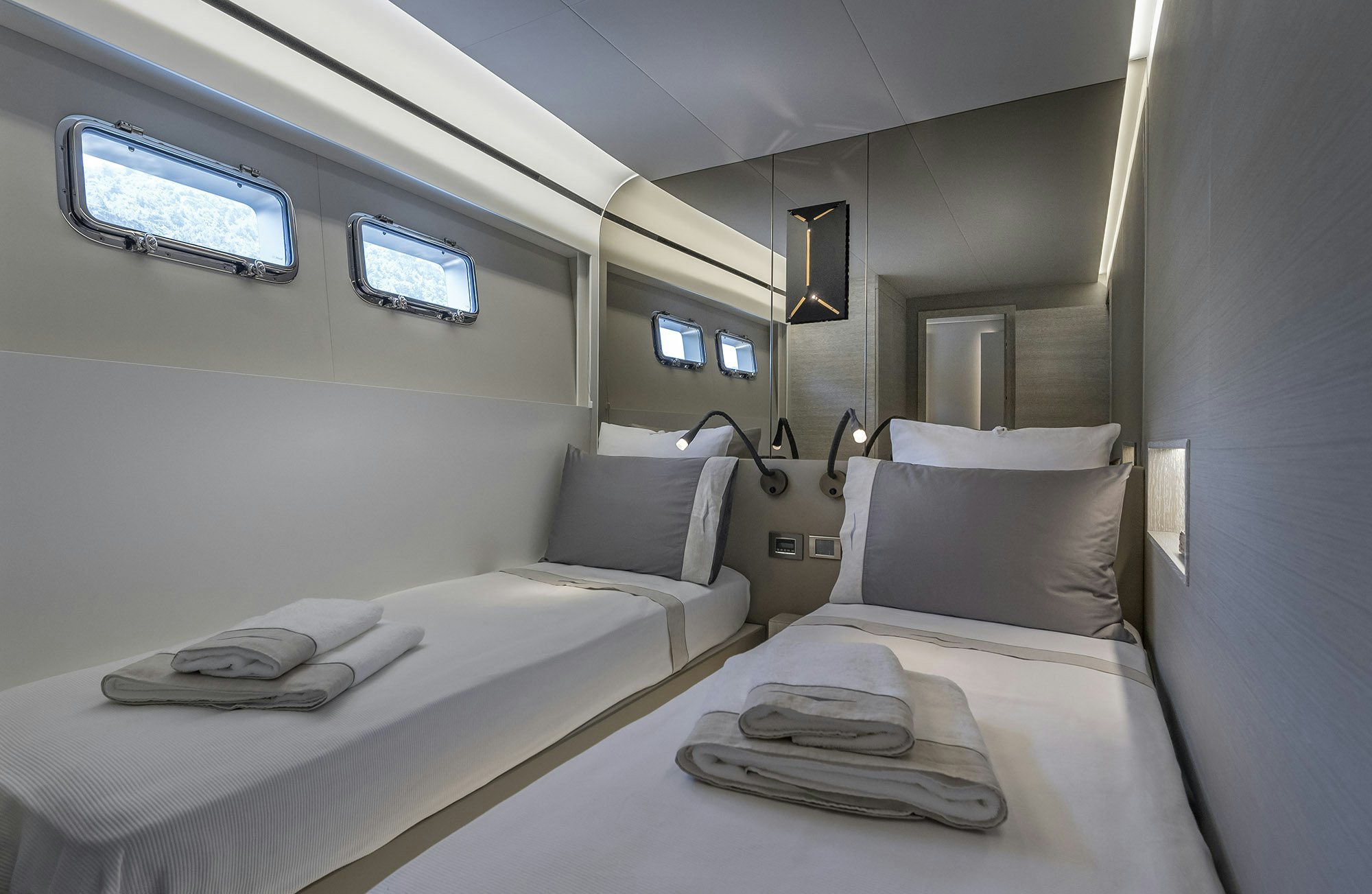 a room with two beds aboard NUMARINE 26XP/25 Yacht for Sale