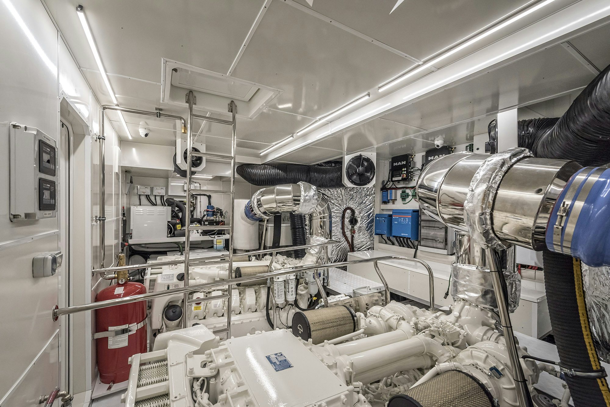 a large room with machinery aboard NUMARINE 26XP/25 Yacht for Sale