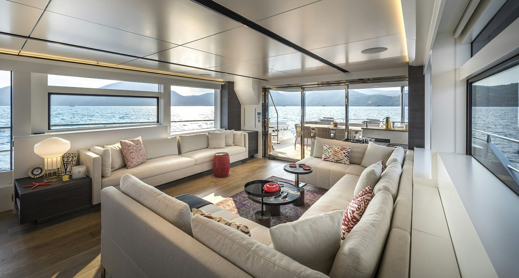 a living room with a large window aboard NUMARINE 26XP/25 Yacht for Sale