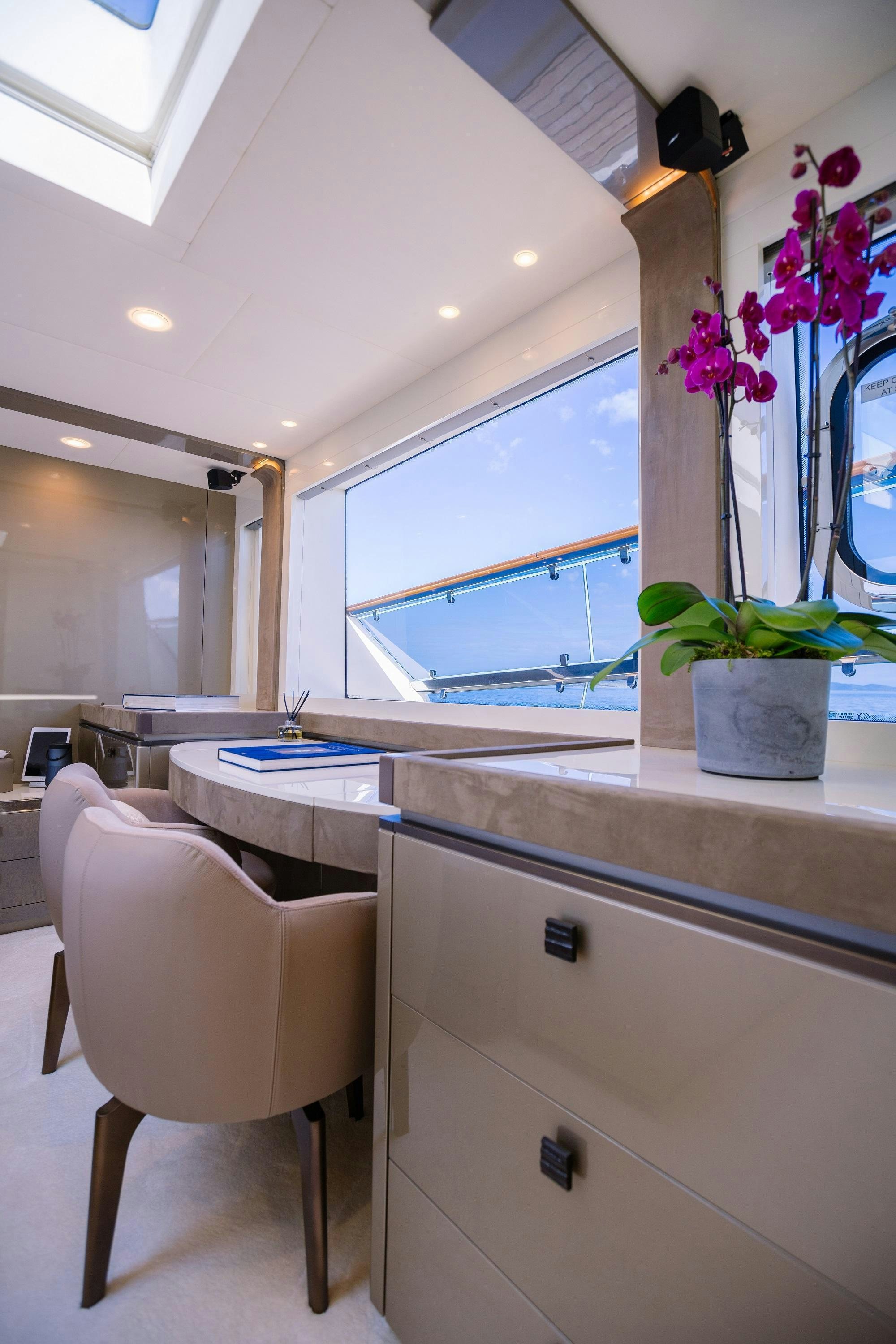 a kitchen with a large window aboard VIVALDI Yacht for Charter
