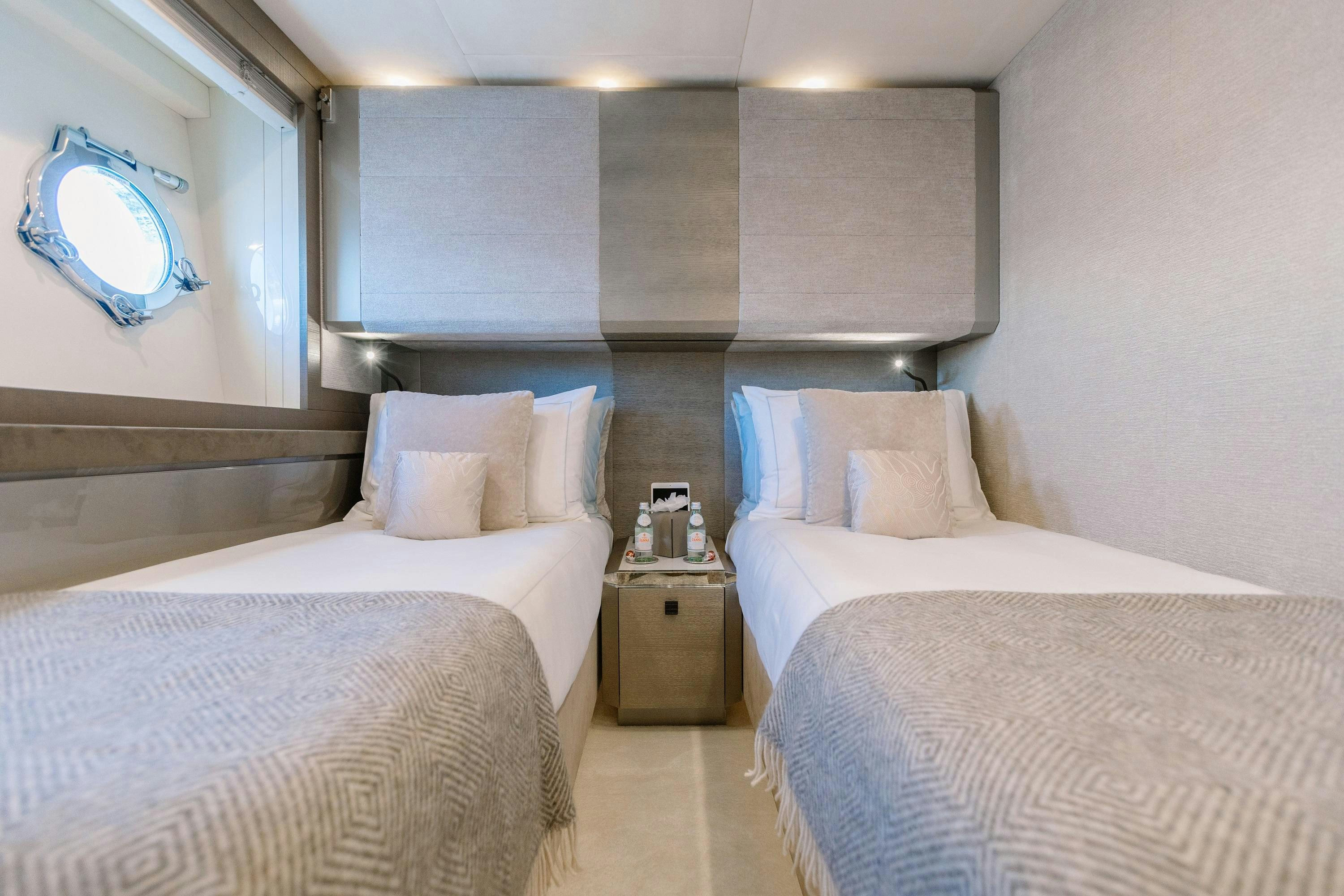 a couple of beds in a room aboard VIVALDI Yacht for Charter