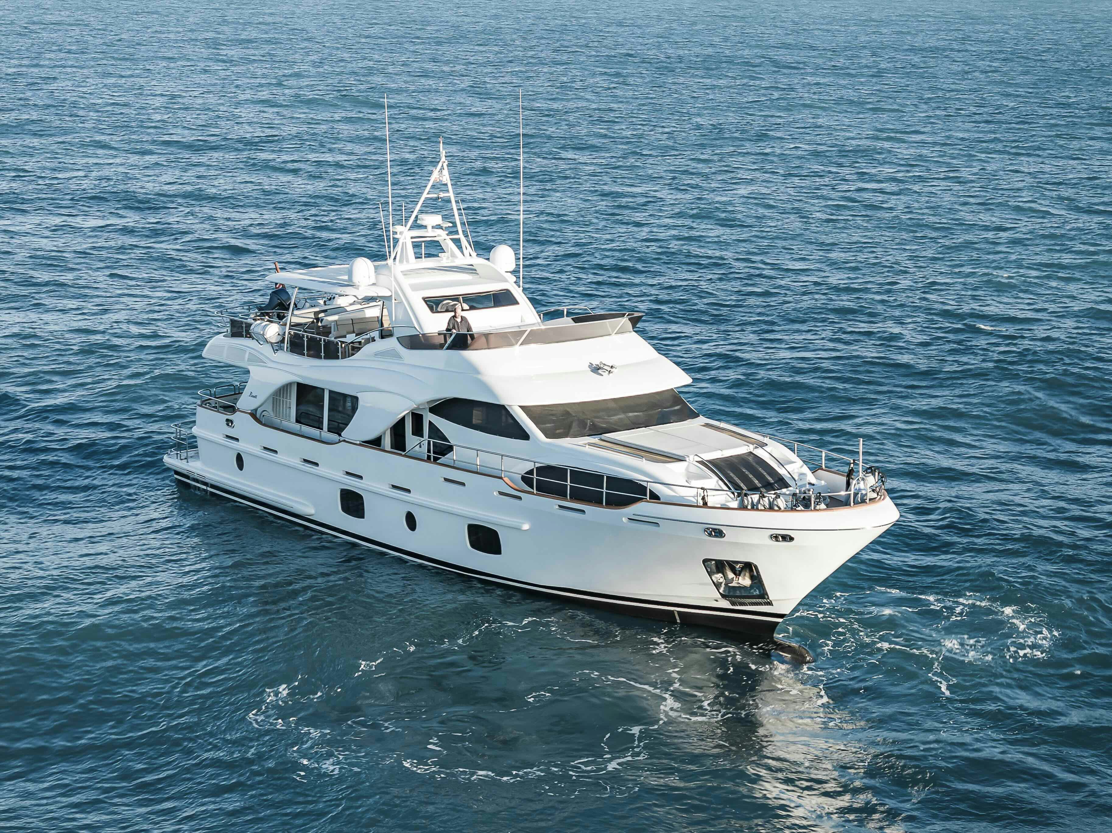 a white yacht in the water aboard ROSE OF KINGSTON II Yacht for Sale