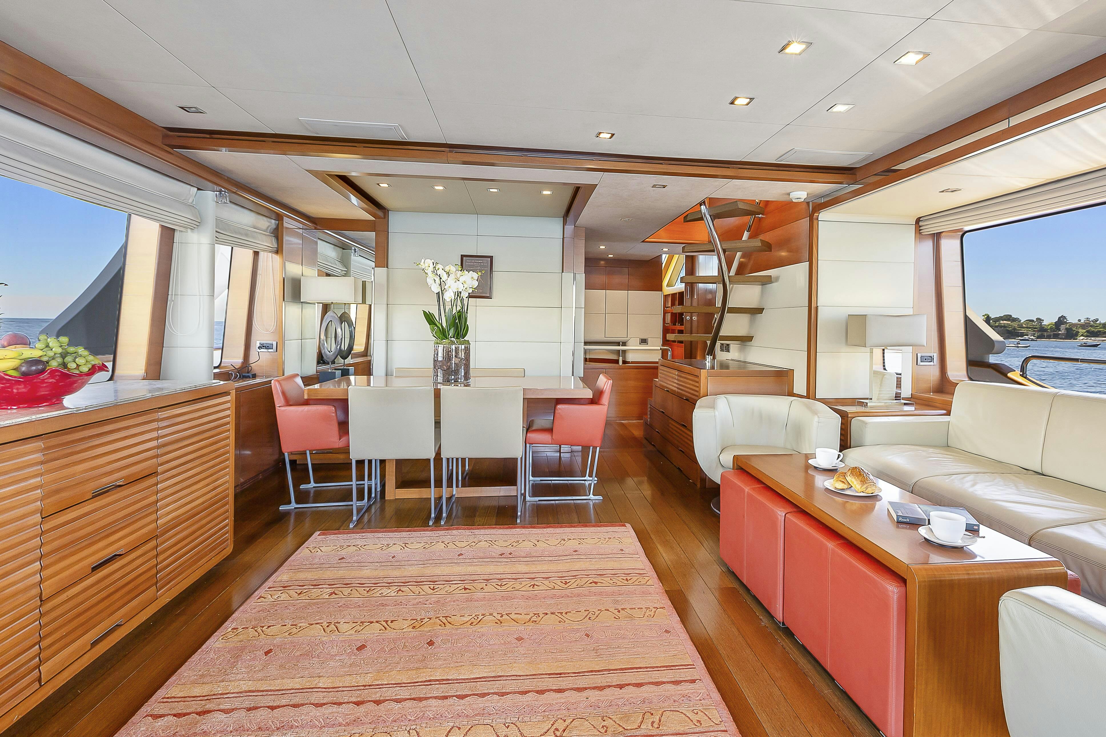 a large kitchen and living room aboard ROSE OF KINGSTON II Yacht for Sale
