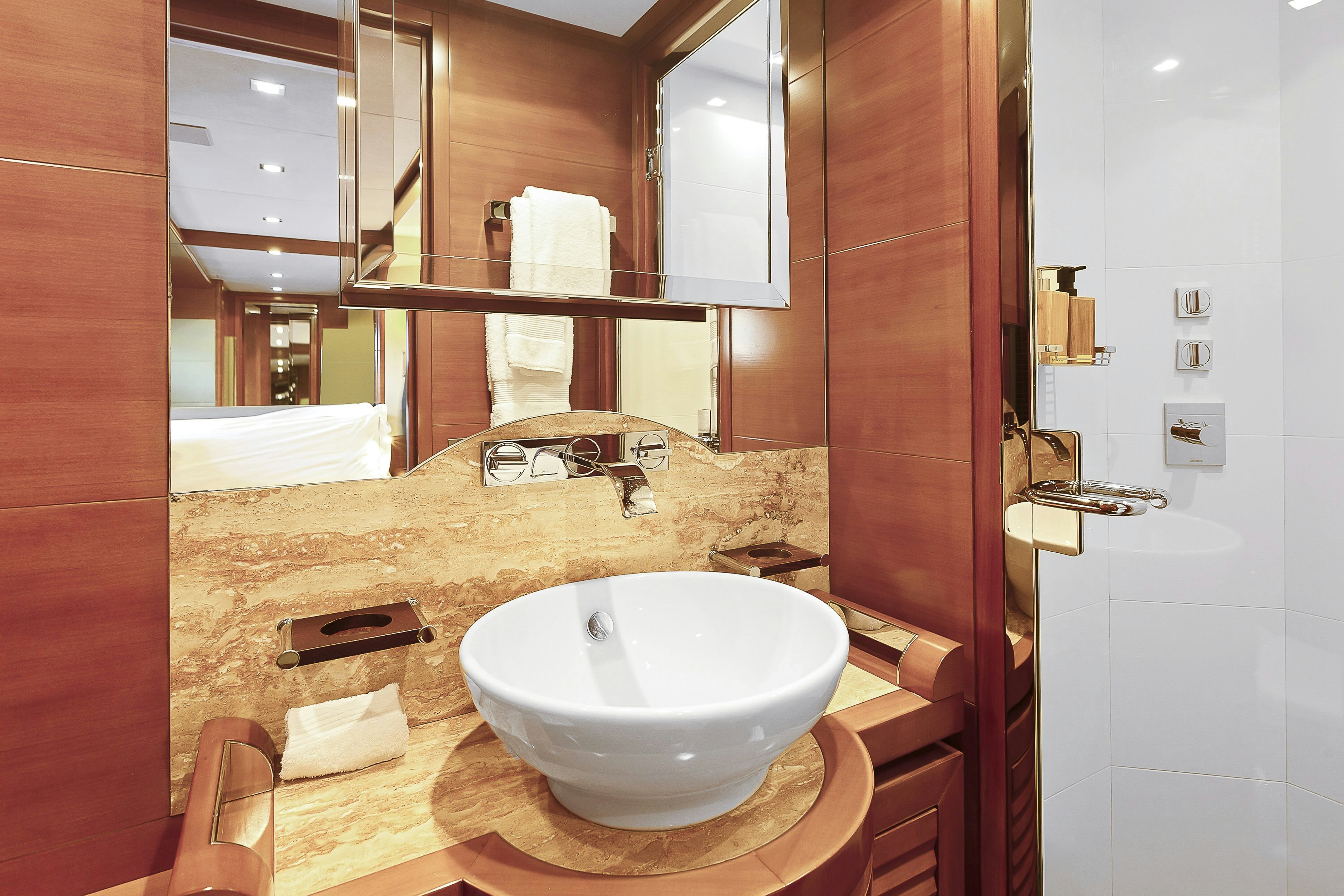 a bathroom with a sink and a mirror aboard ROSE OF KINGSTON II Yacht for Sale