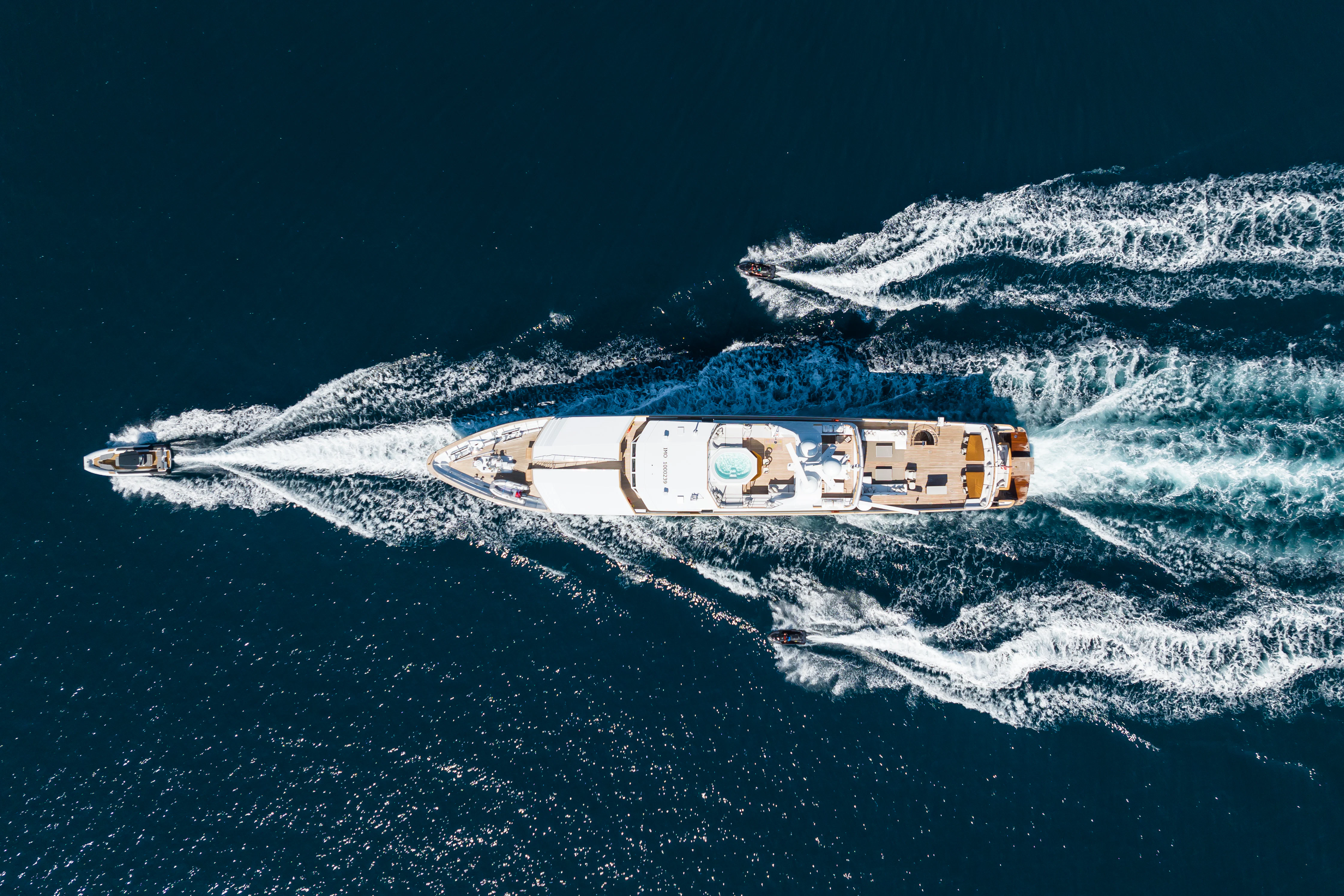 a space shuttle above the earth aboard EMERALD Yacht for Charter