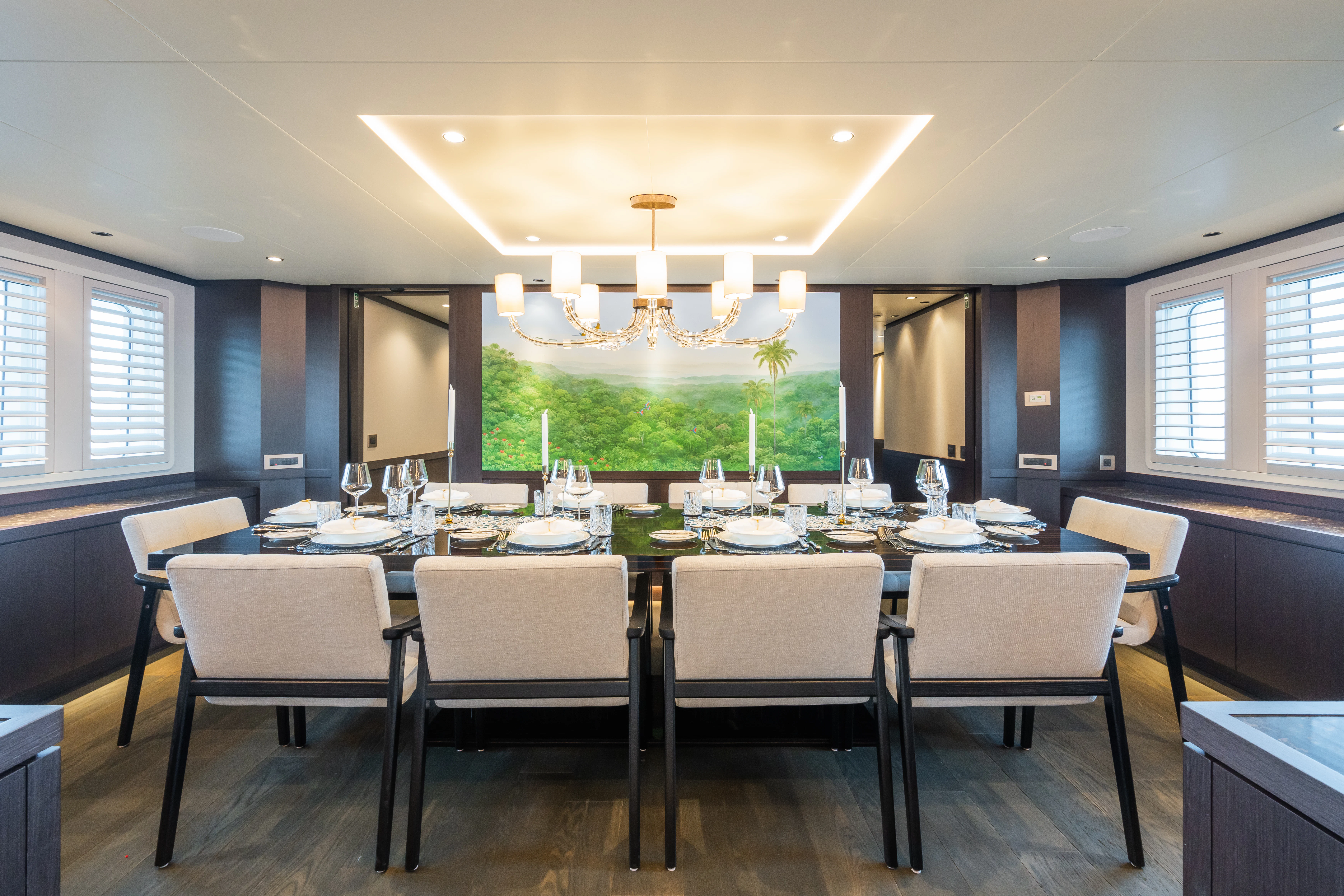a large dining room with a large table and chairs aboard EMERALD Yacht for Charter