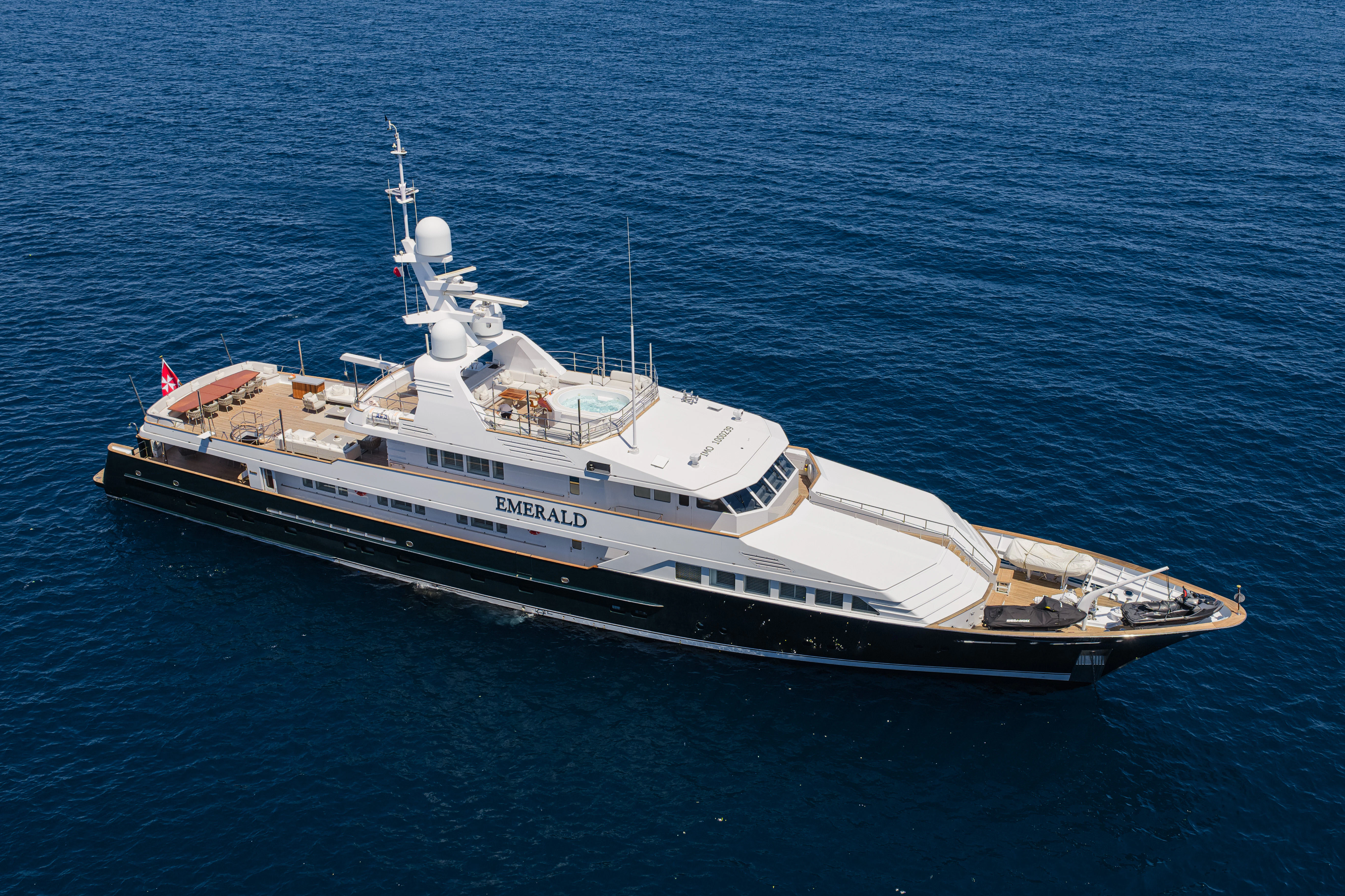 a large ship in the water aboard EMERALD Yacht for Sale