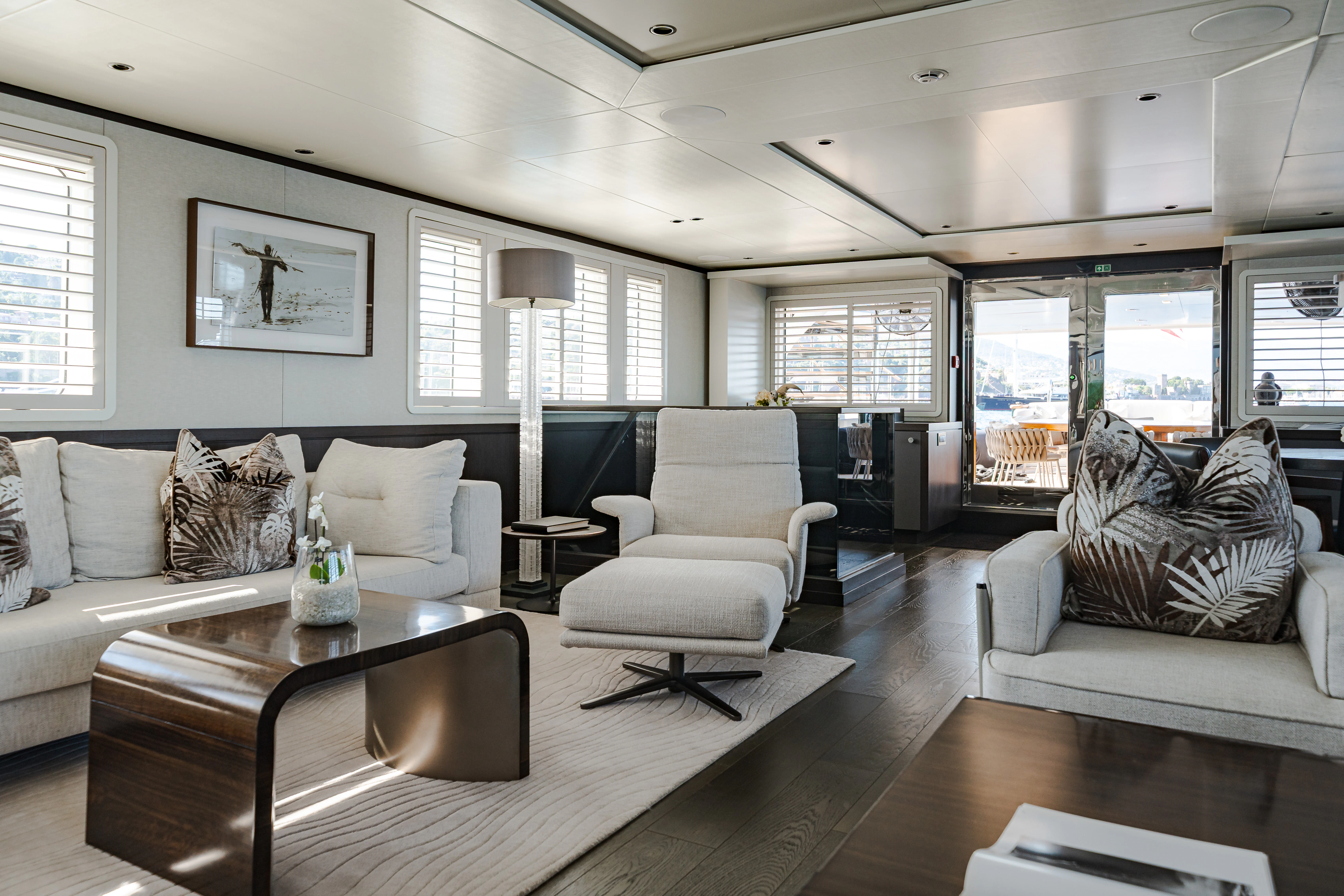a living room with a large window aboard EMERALD Yacht for Sale