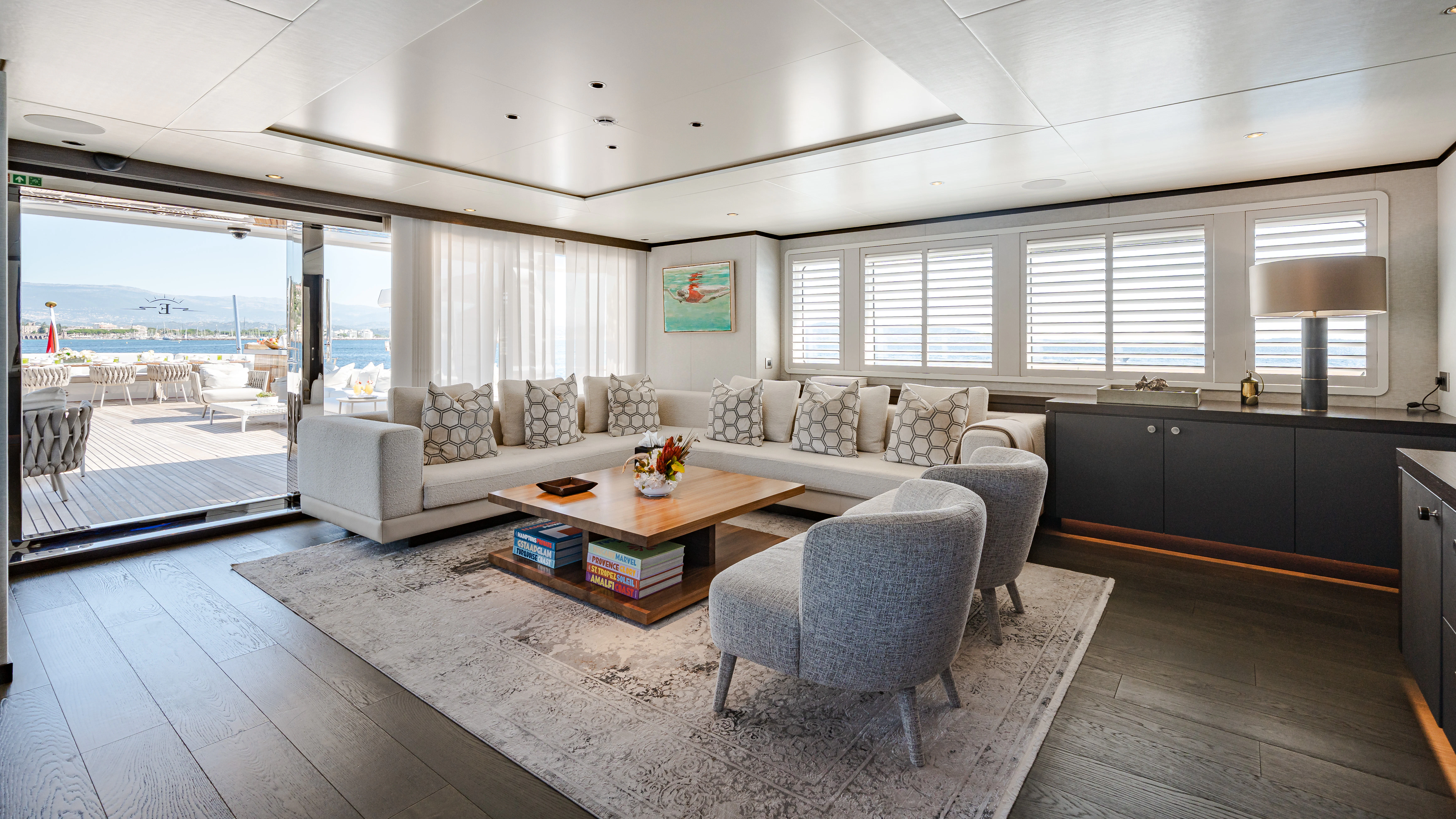 a living room with a large window aboard EMERALD Yacht for Sale