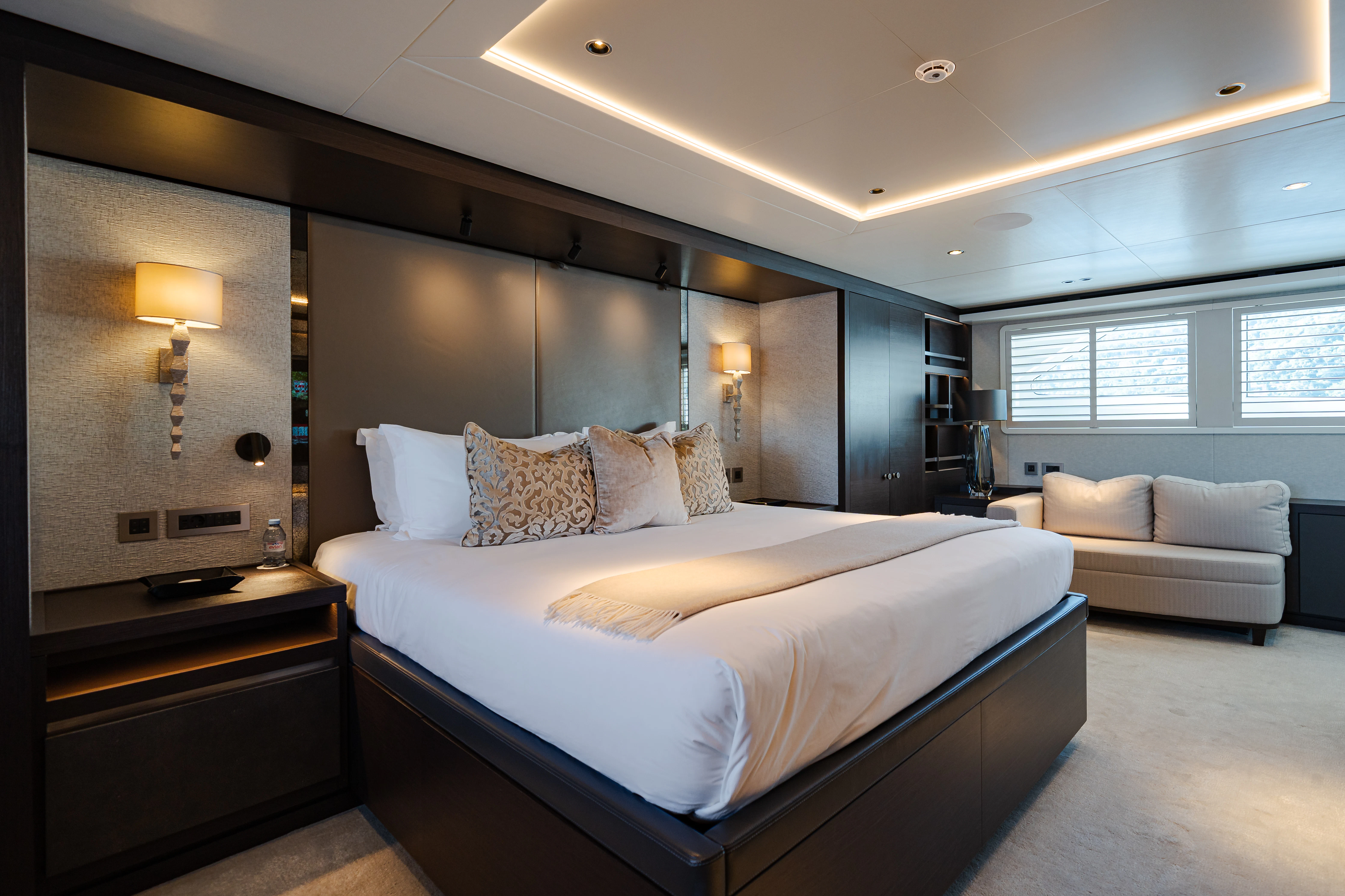 a large bedroom with a bed aboard EMERALD Yacht for Sale