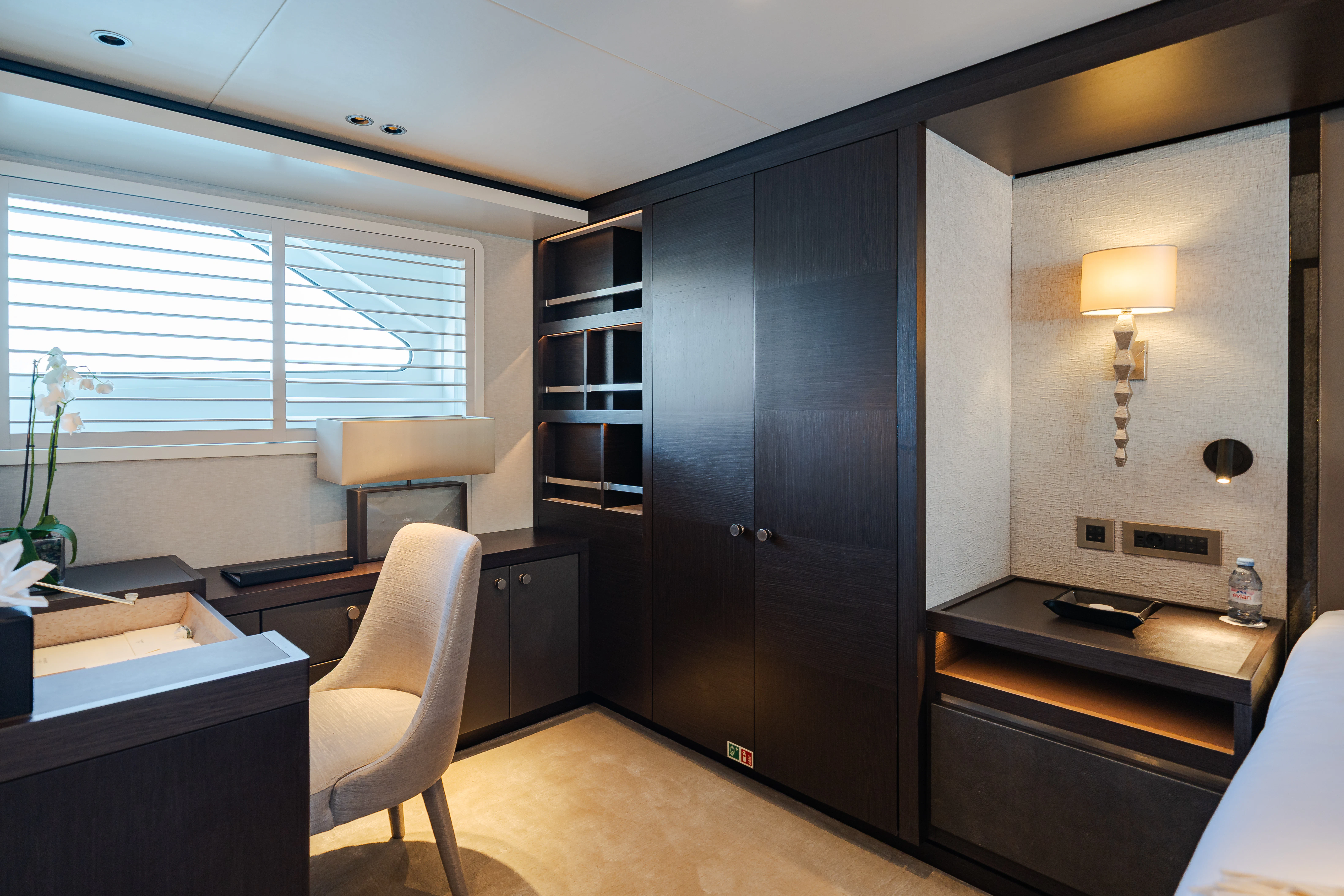 a room with a desk and a chair aboard EMERALD Yacht for Sale