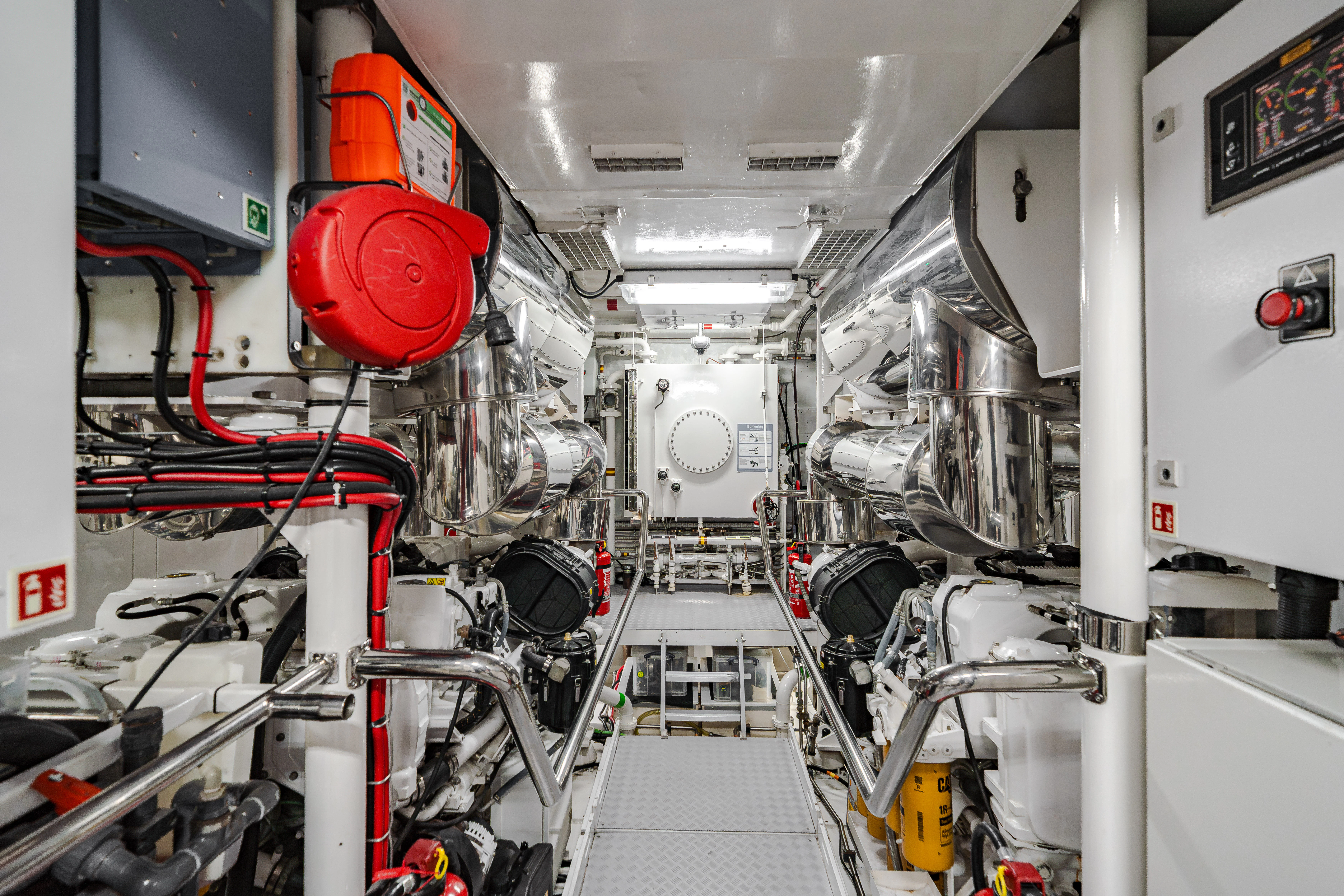 a large white machine with red wheels aboard EMERALD Yacht for Sale