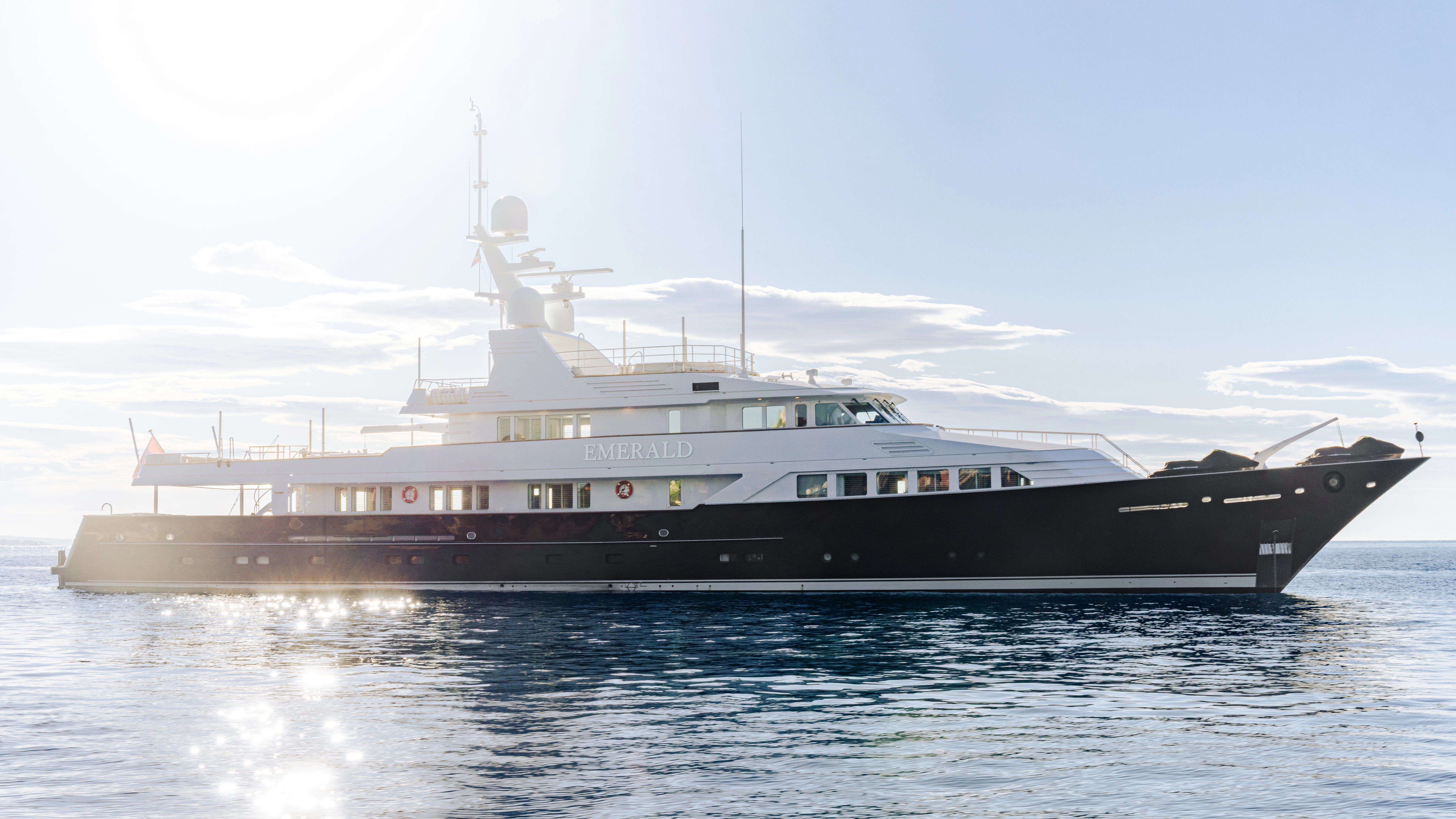a large ship in the water aboard EMERALD Yacht for Sale