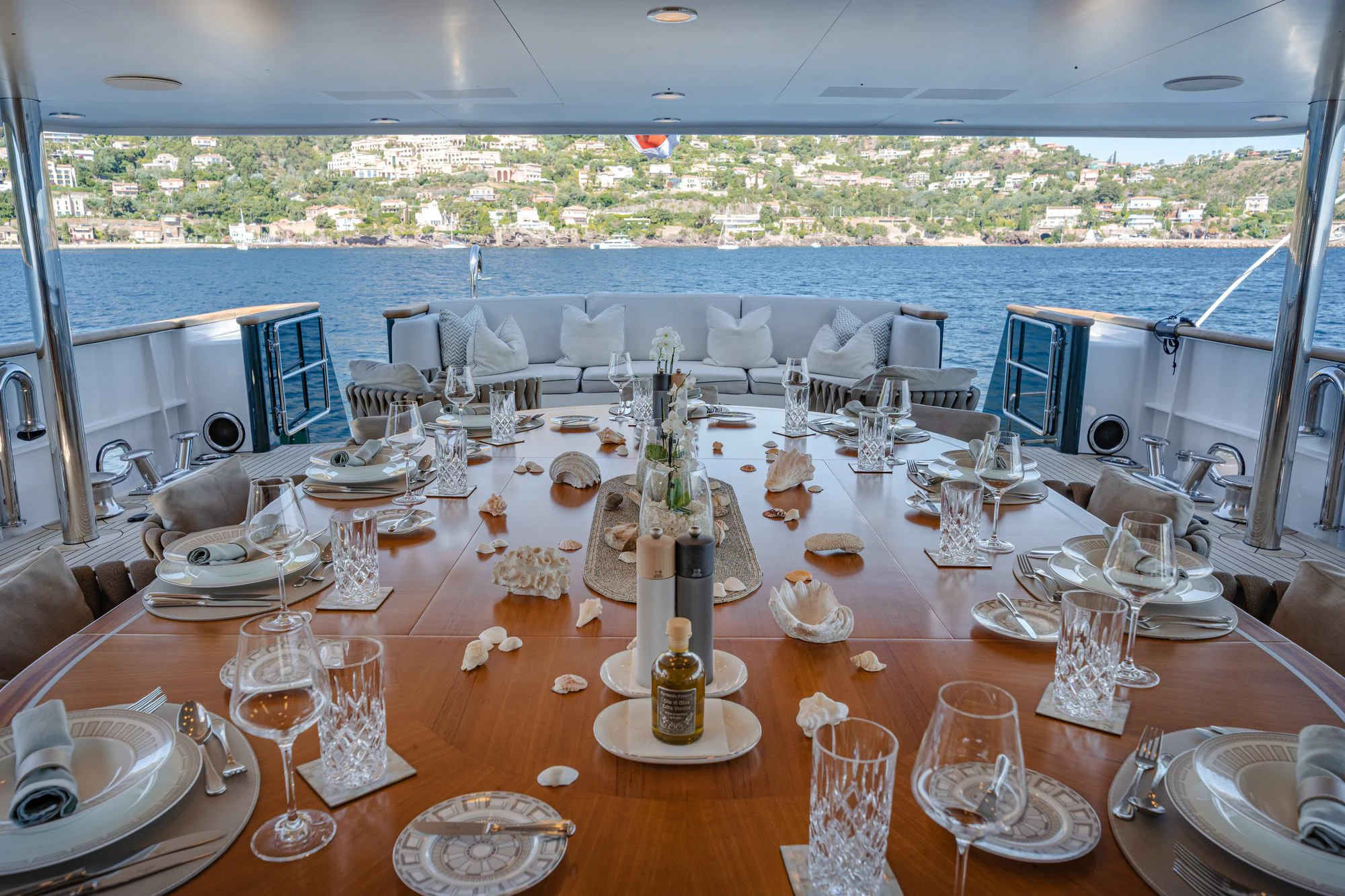 a table set for a dinner party aboard EMERALD Yacht for Charter