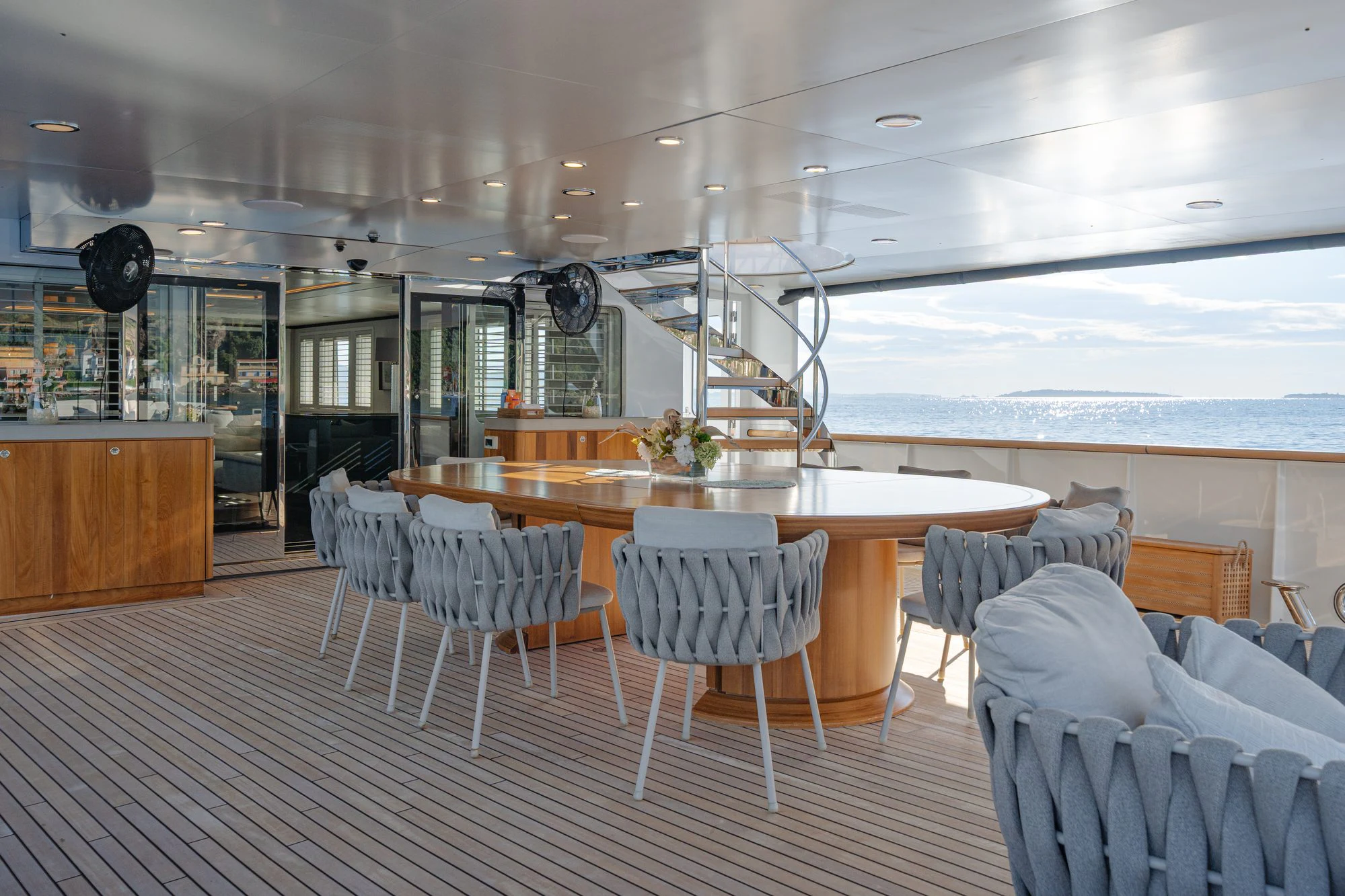 a room with a table and chairs aboard EMERALD Yacht for Charter