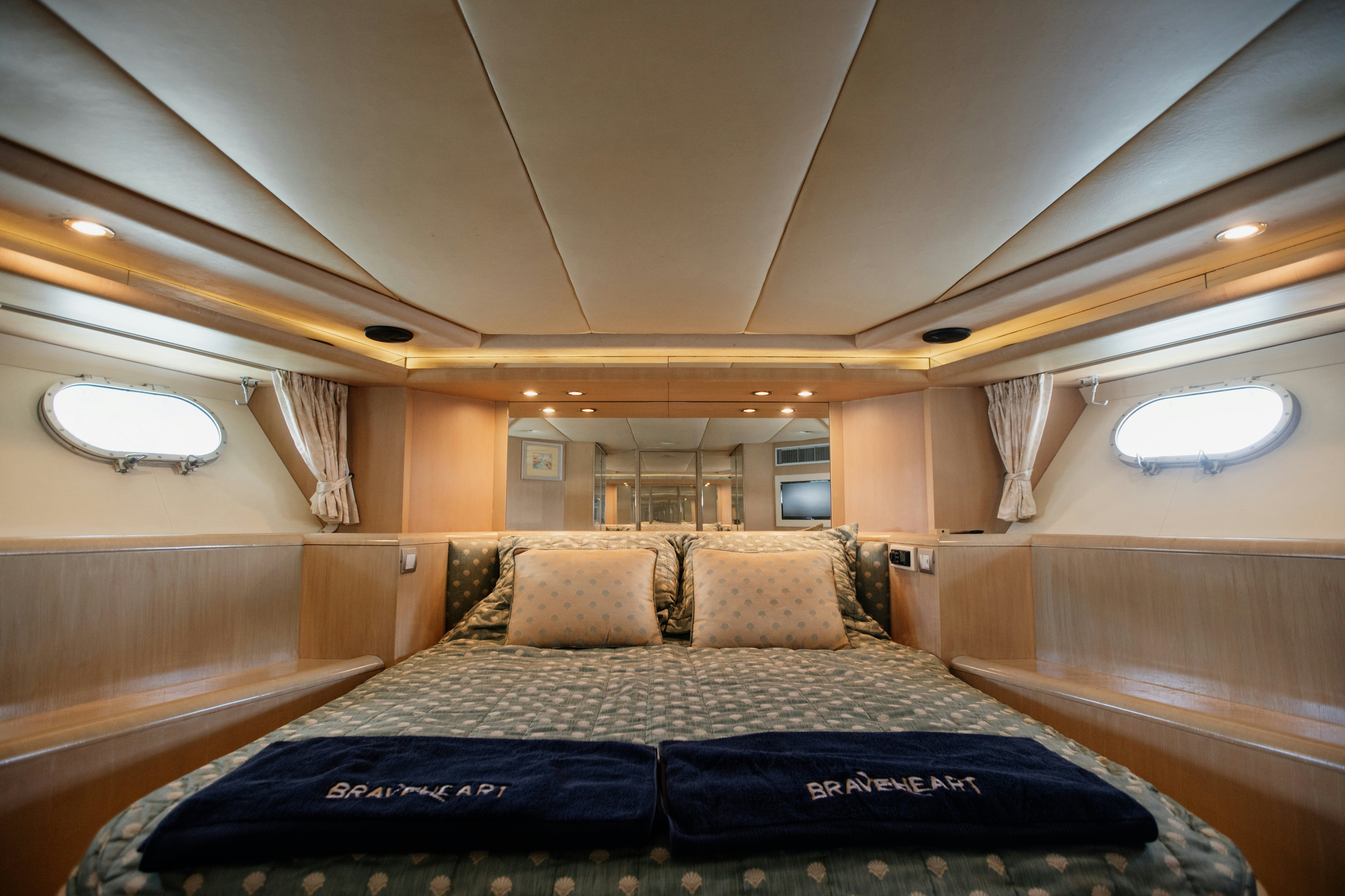 a bed in a room aboard BRAVEHEART 2 Yacht for Sale