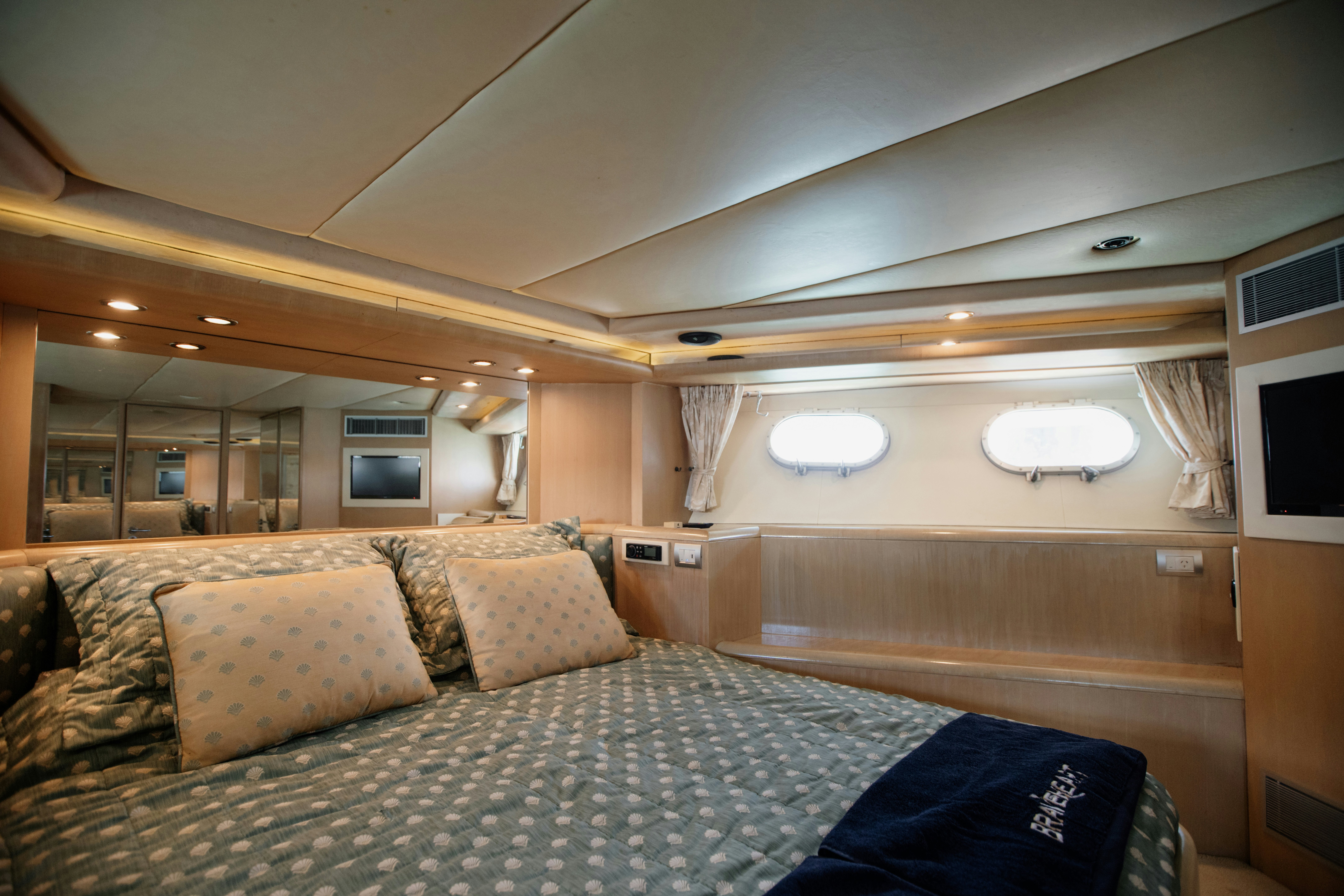 a bed in a room aboard BRAVEHEART 2 Yacht for Sale