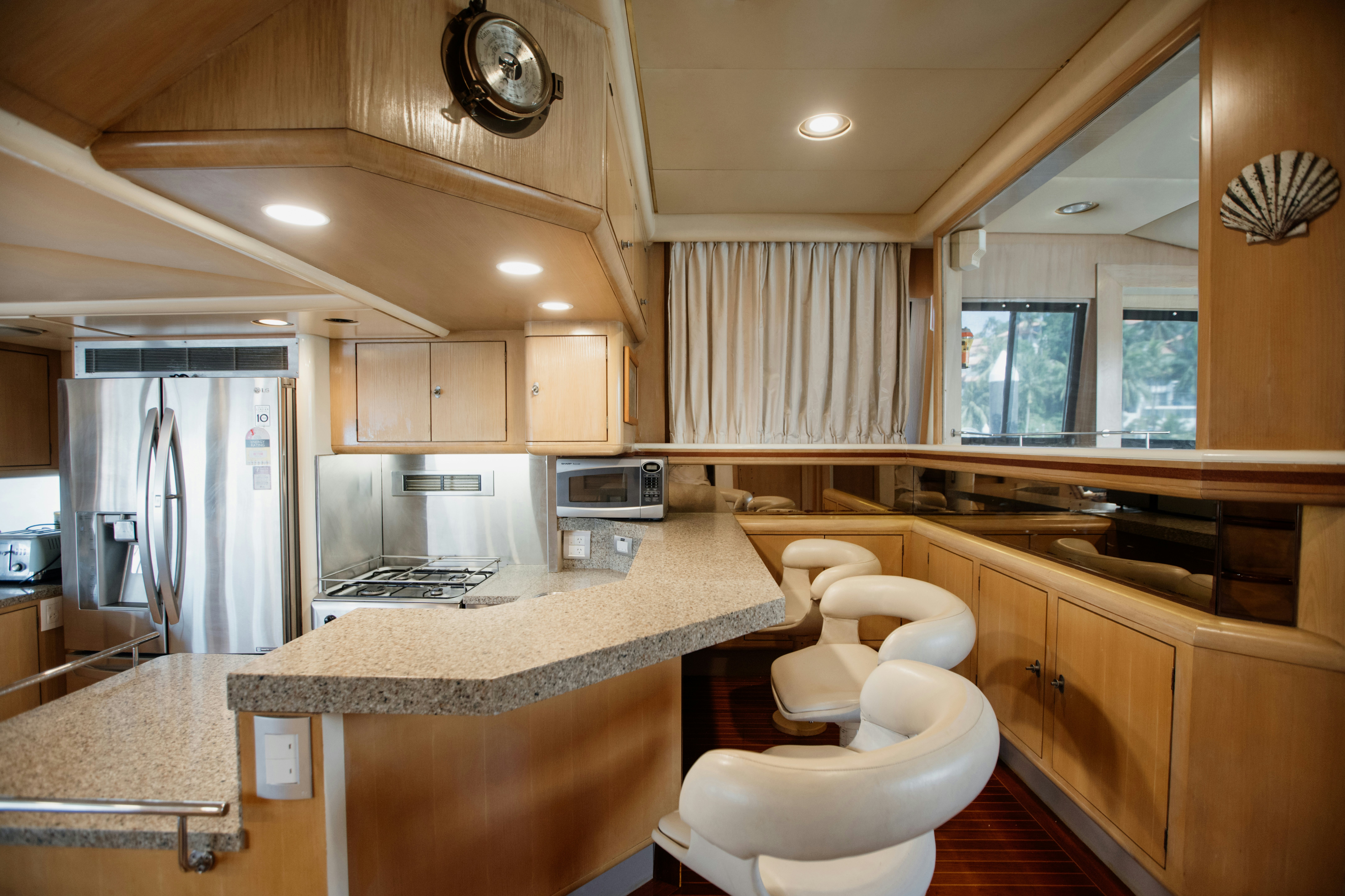a kitchen with a large island aboard BRAVEHEART 2 Yacht for Sale