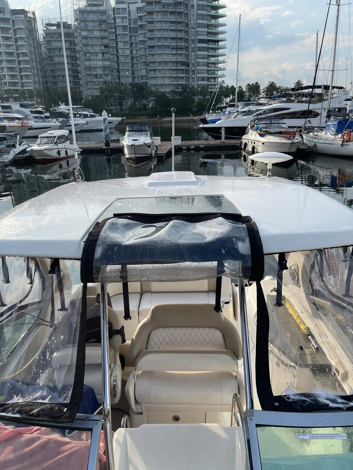 a boat with a cover on it aboard GNARALOO Yacht for Sale