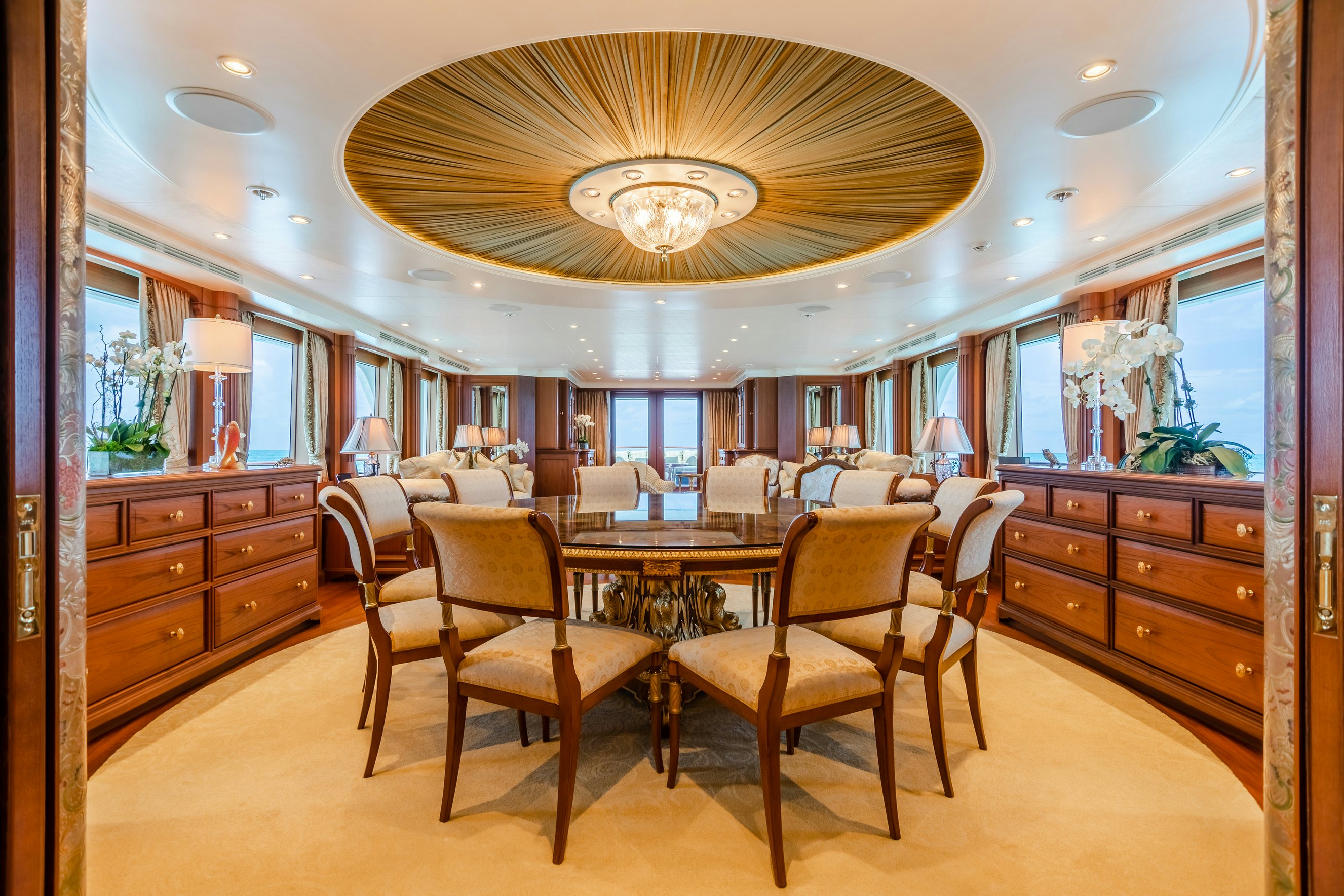 a kitchen with a dining table aboard SHADOWL Yacht for Charter