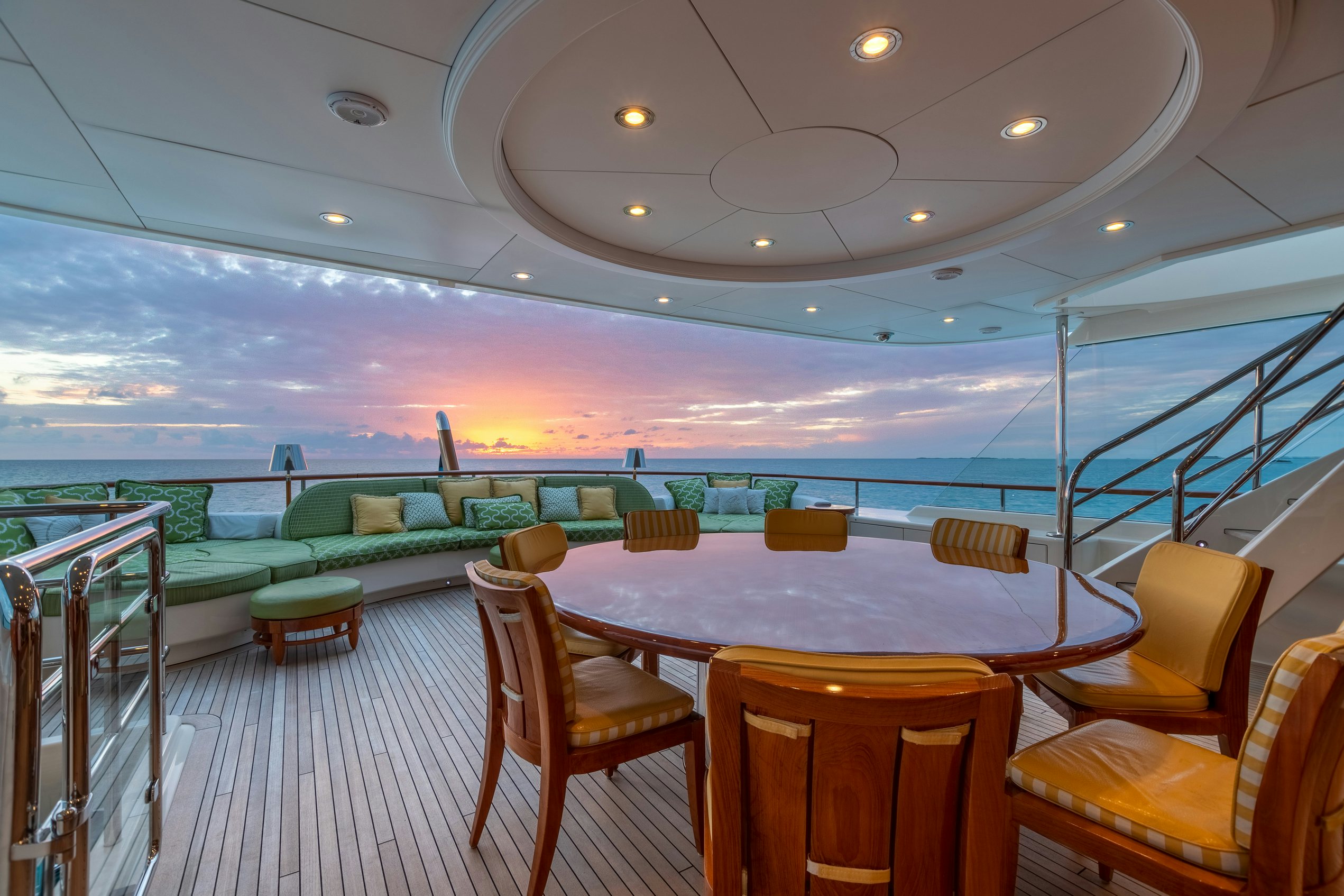 a room with a table and chairs aboard SHADOWL Yacht for Charter