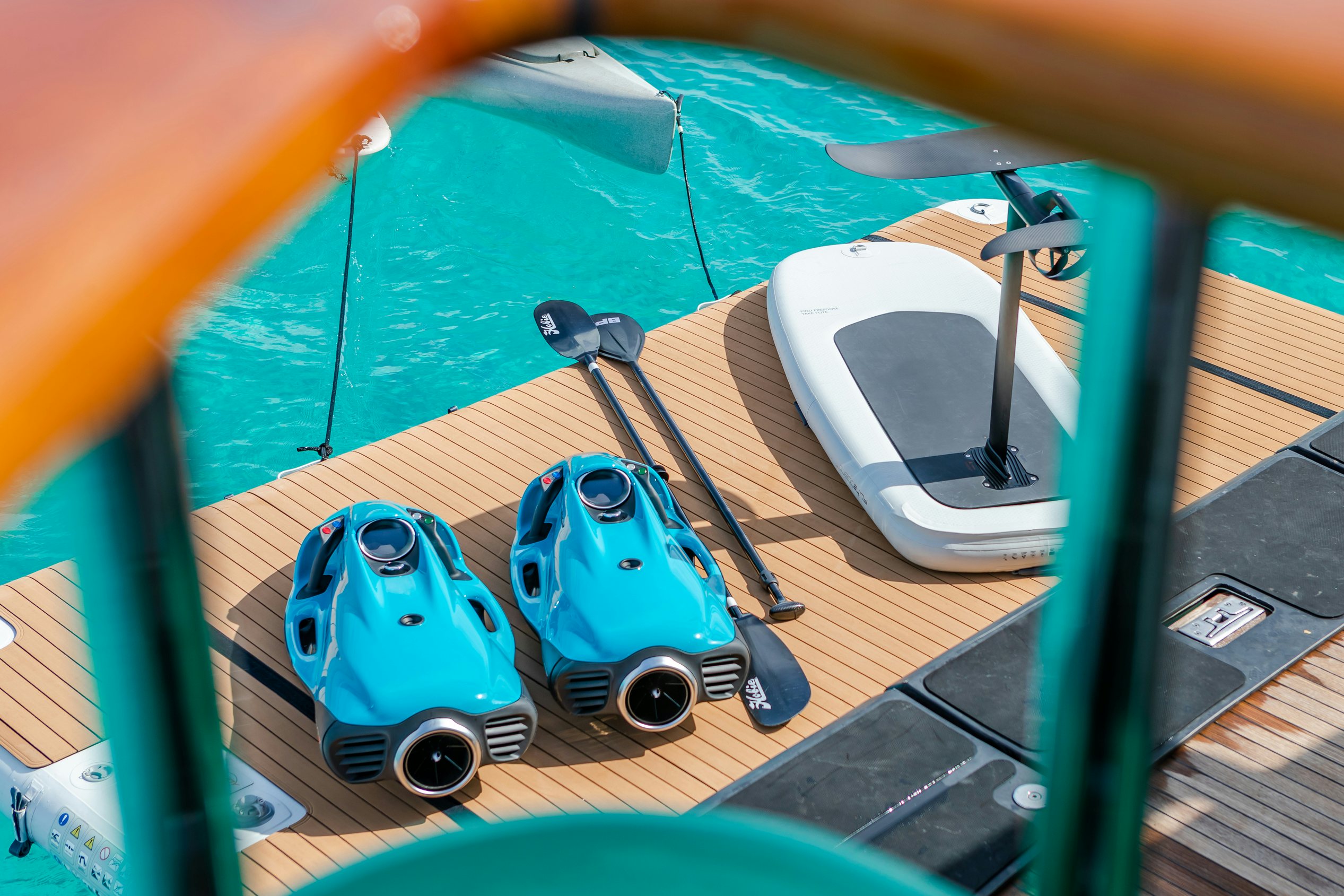 a toy robot on a table aboard SHADOWL Yacht for Charter