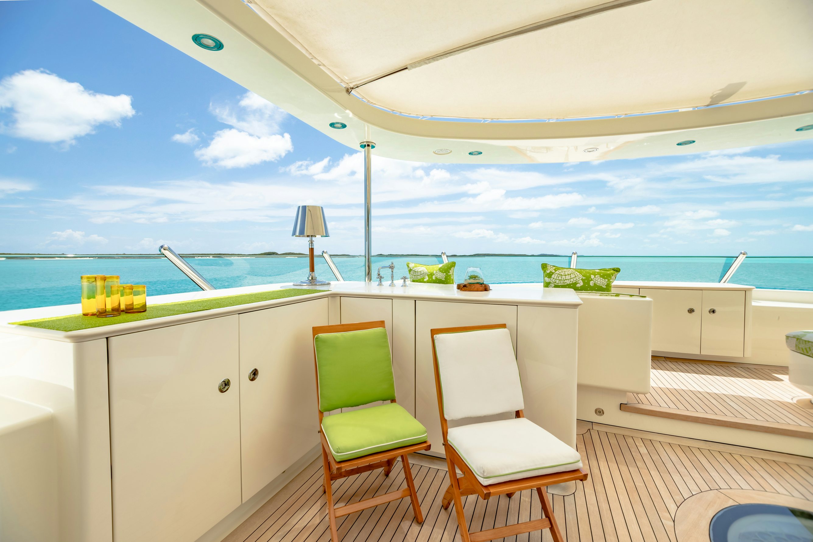 a room with a table and chairs aboard SHADOWL Yacht for Charter