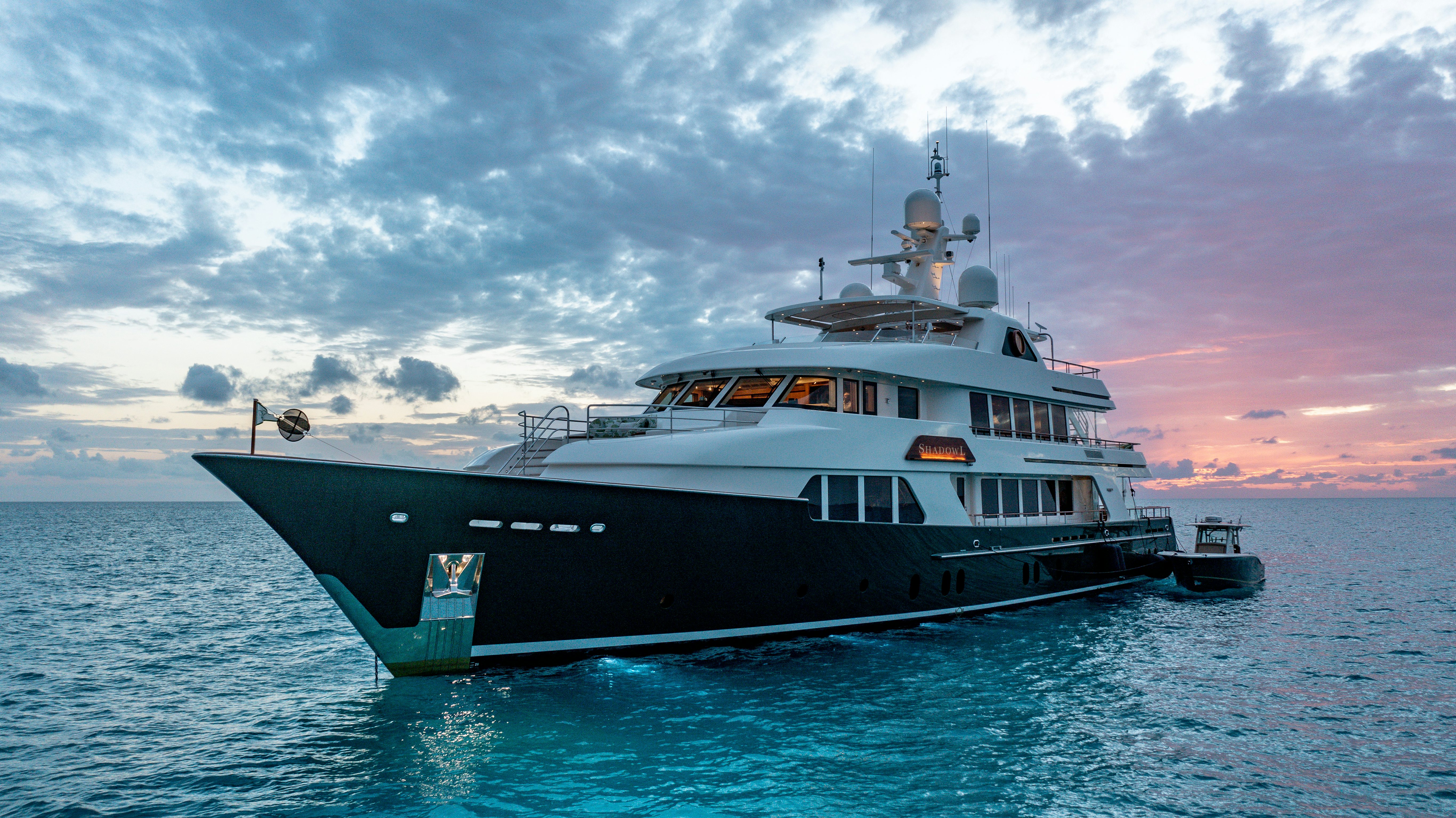 a large boat in the water aboard SHADOWL Yacht for Sale