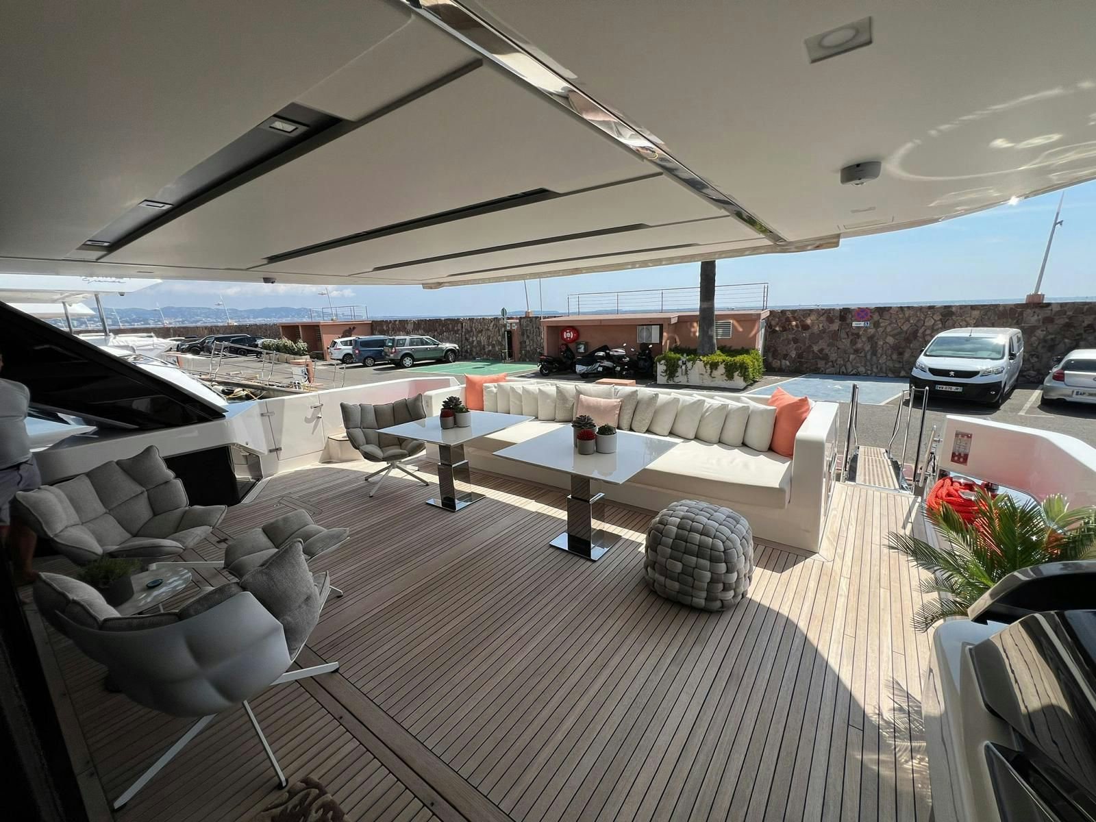a patio with a table and chairs aboard MAREA Yacht for Sale