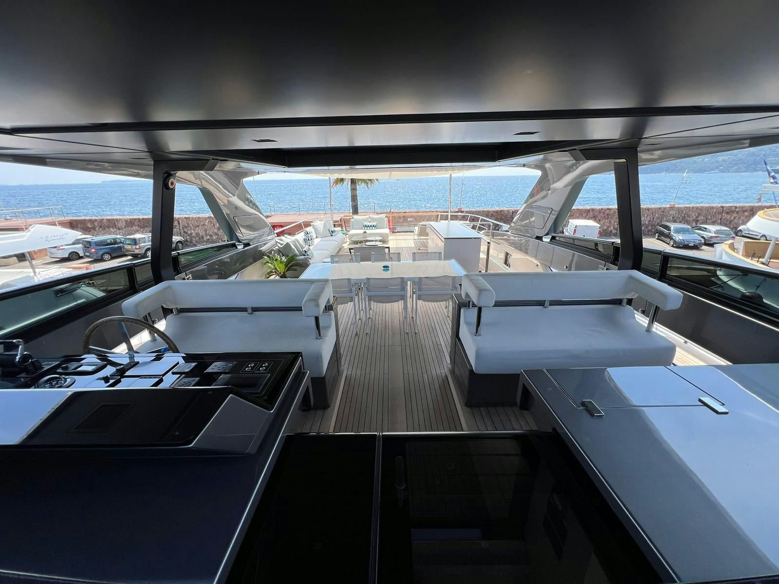 a deck with a deck and boats on it aboard MAREA Yacht for Sale