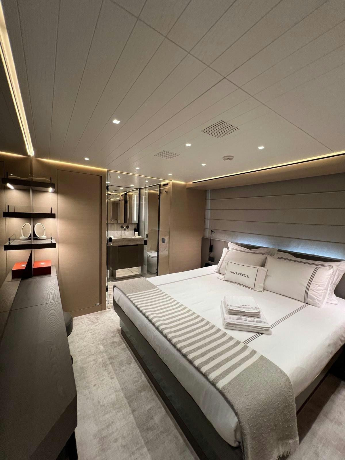 a large white bed in a room aboard MAREA Yacht for Sale